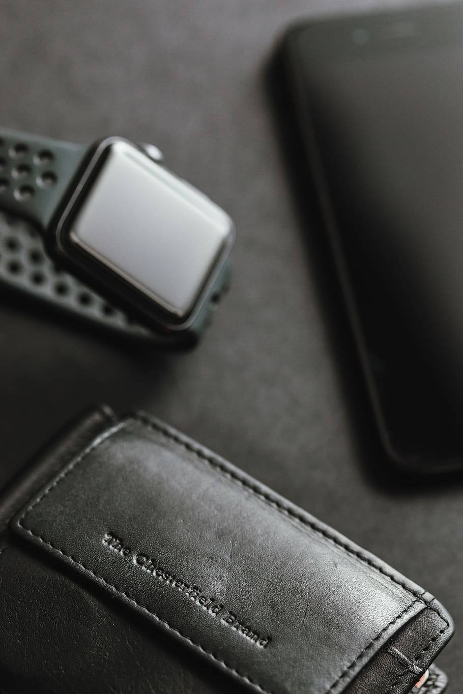 black leather iPhone, sleek black smartwatch, leather wallet, HD Phone Wallpaper