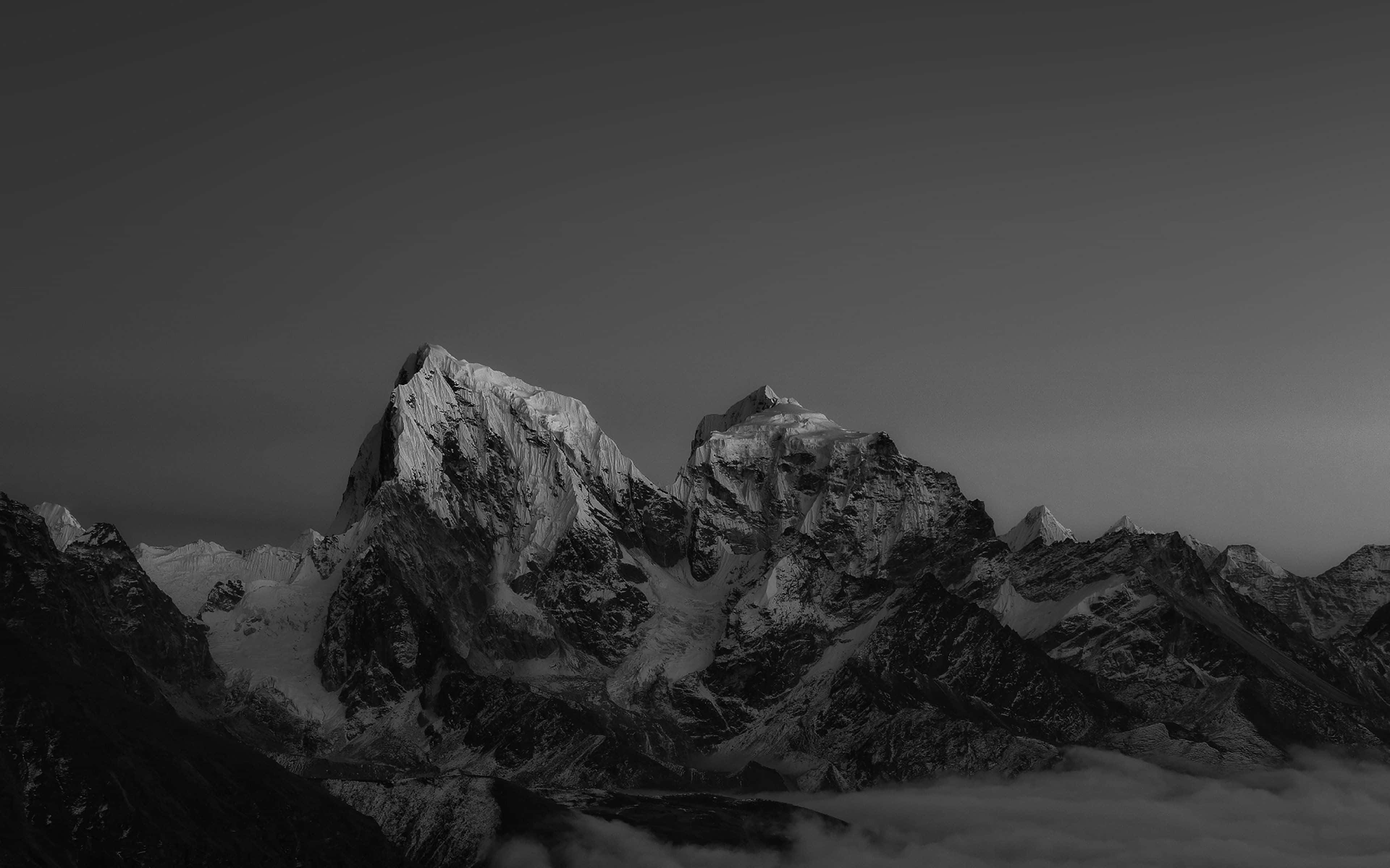 Black Macbook, monochrome mountain peaks, sea of clouds, 4K Desktop Wallpaper
