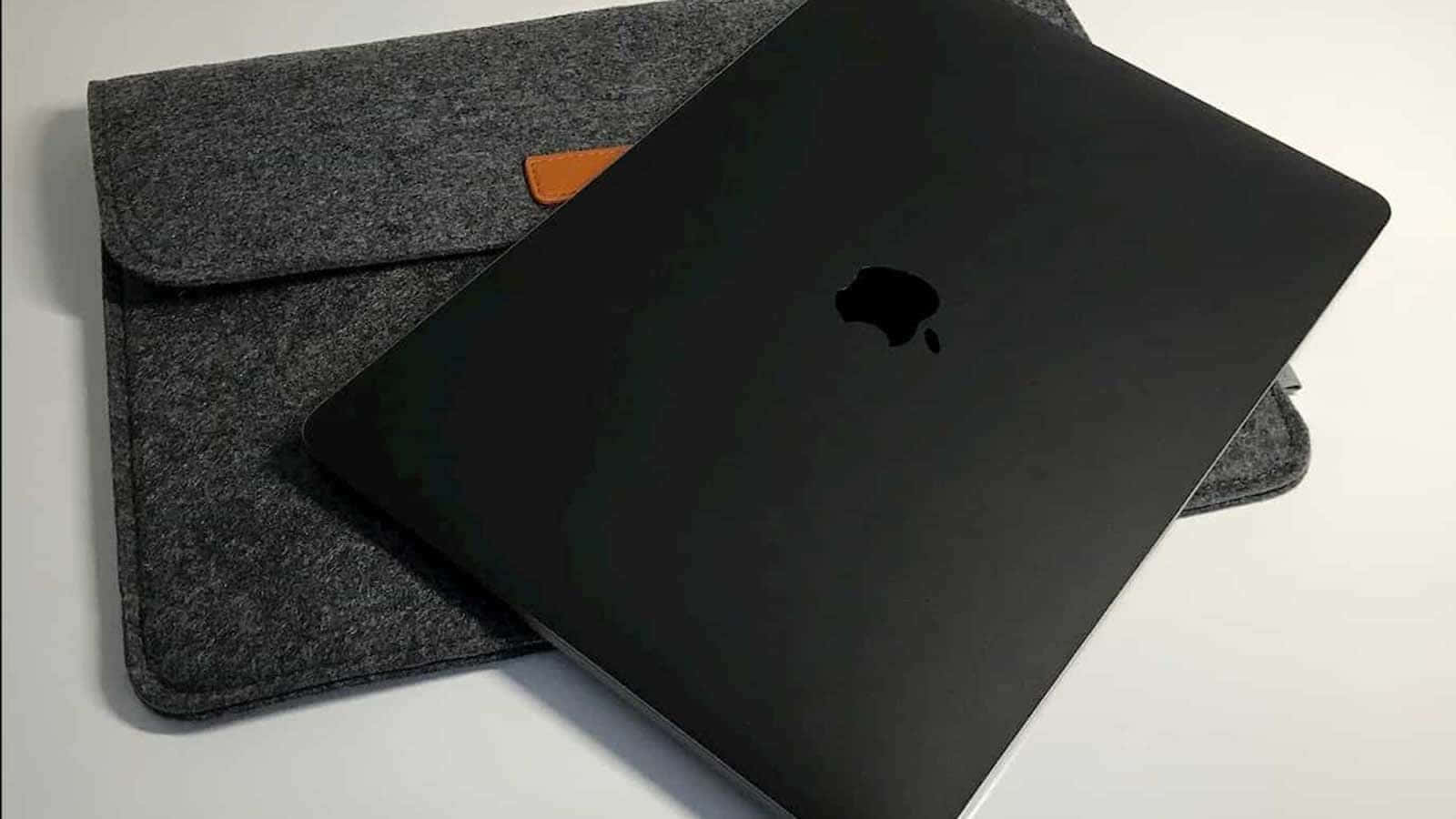 Black Macbook, gray felt sleeve, orange leather accent, HD Desktop Wallpaper