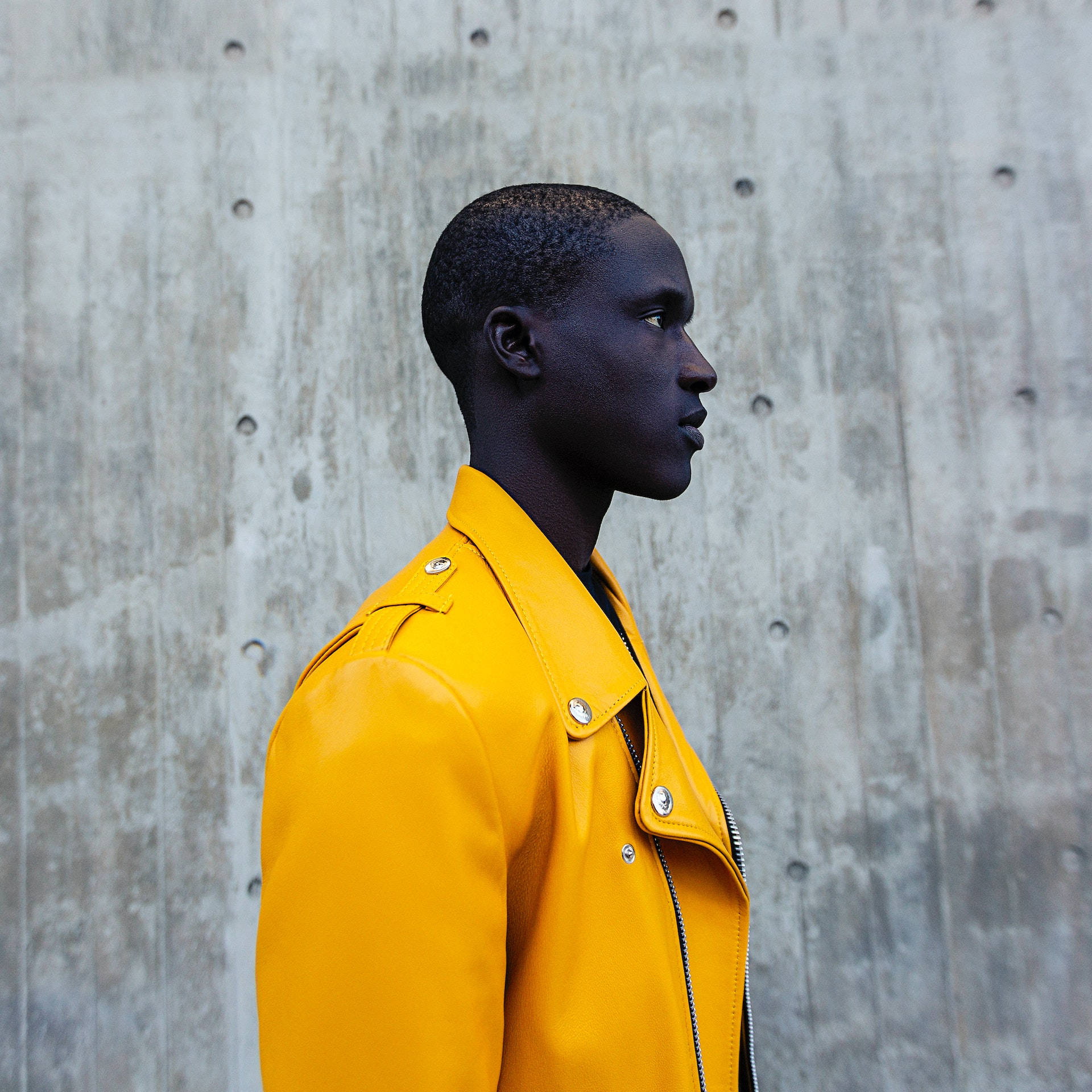 yellow leather jacket, textured concrete wall, profile, Full HD Desktop Wallpaper