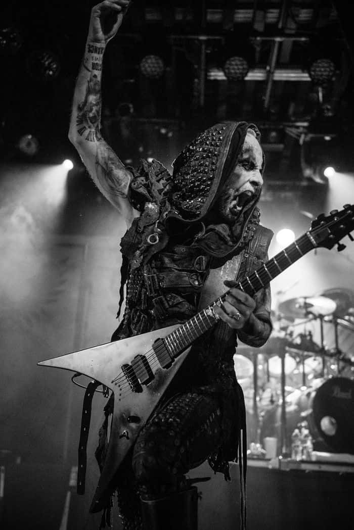 black metal music, metal guitarist, mid-performance, SD Phone Wallpaper