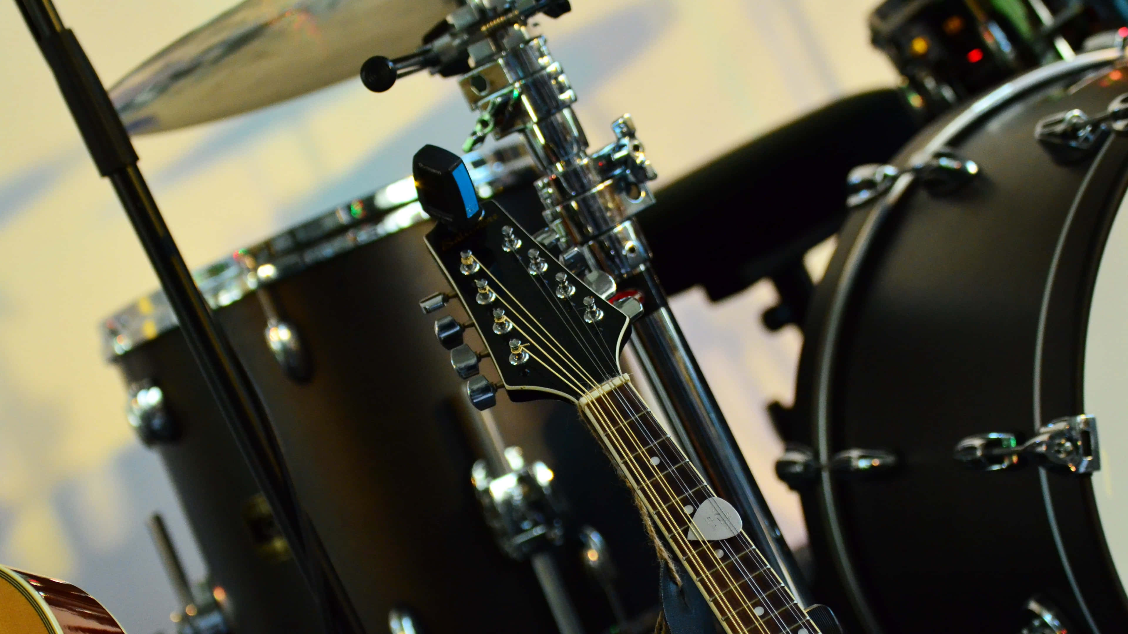 black electric guitar, headstock, drum kit components, 4K Desktop Wallpaper