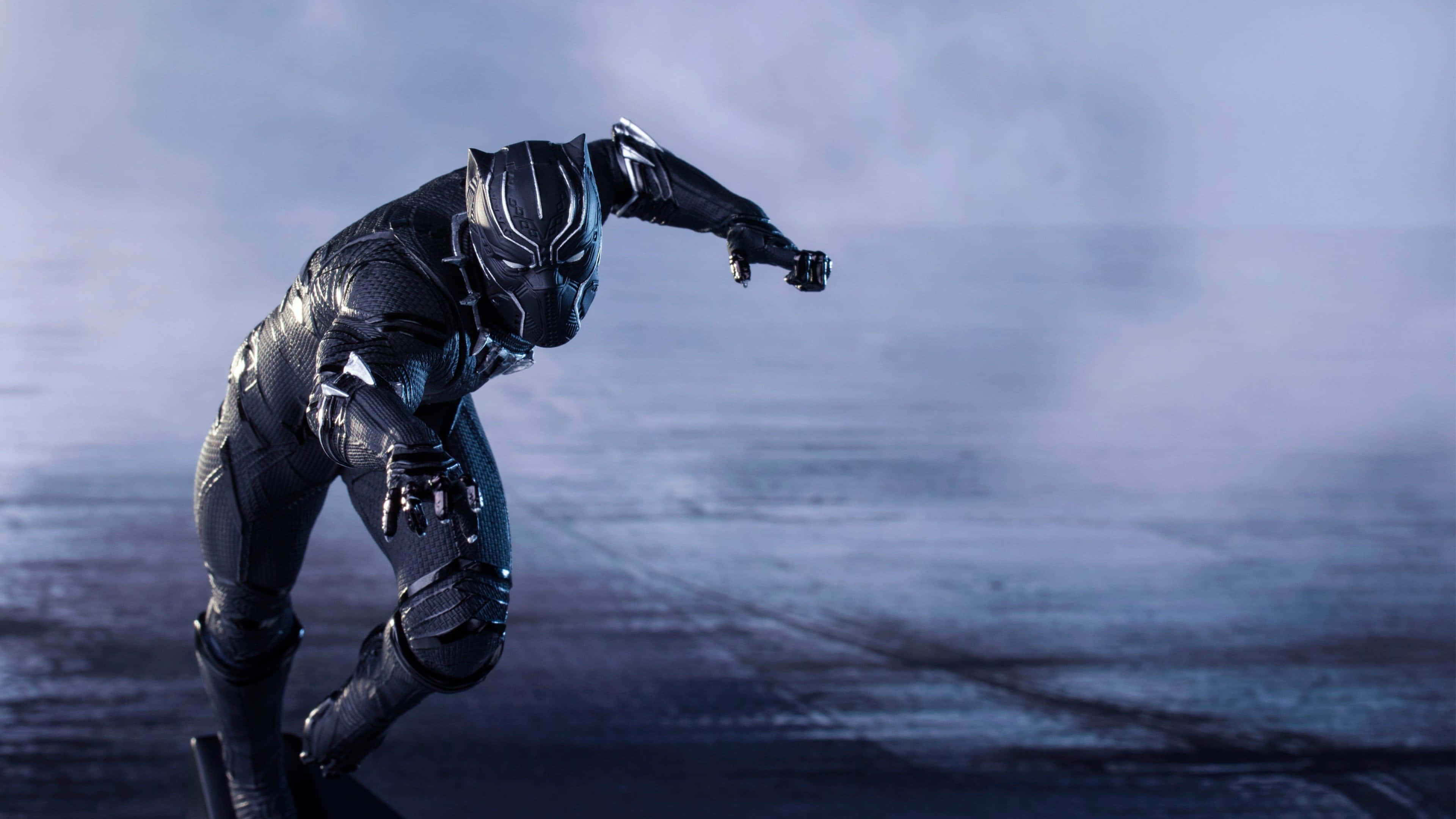 Black Panther, misty blue-gray backdrop, dramatic lighting, 4K Desktop Wallpaper