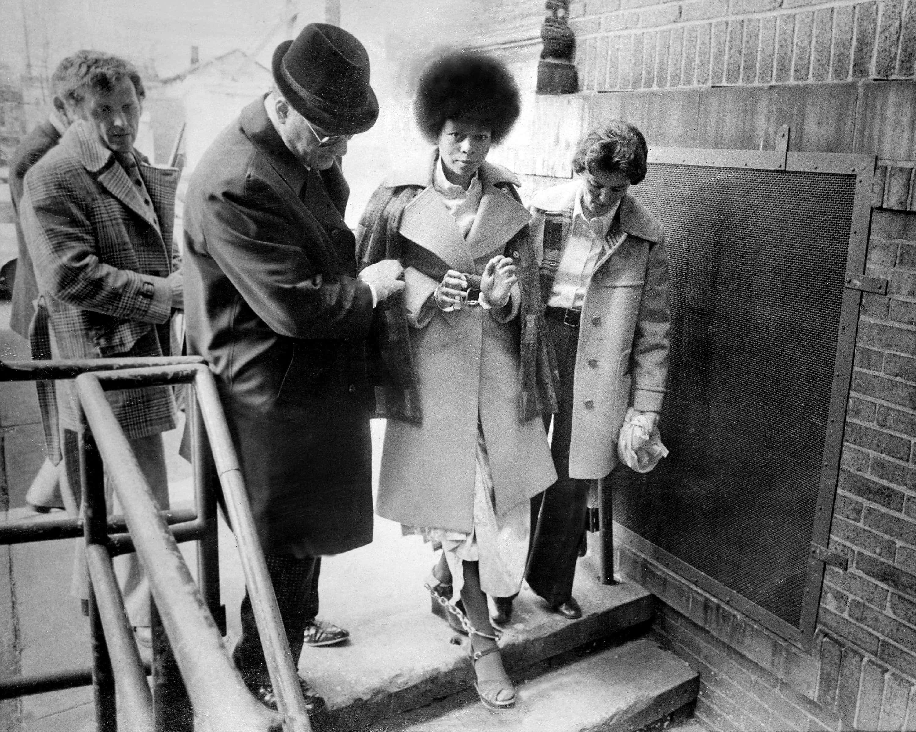 Black Panther Party, afro hairstyle, outdoor stairs, 2K Desktop Wallpaper