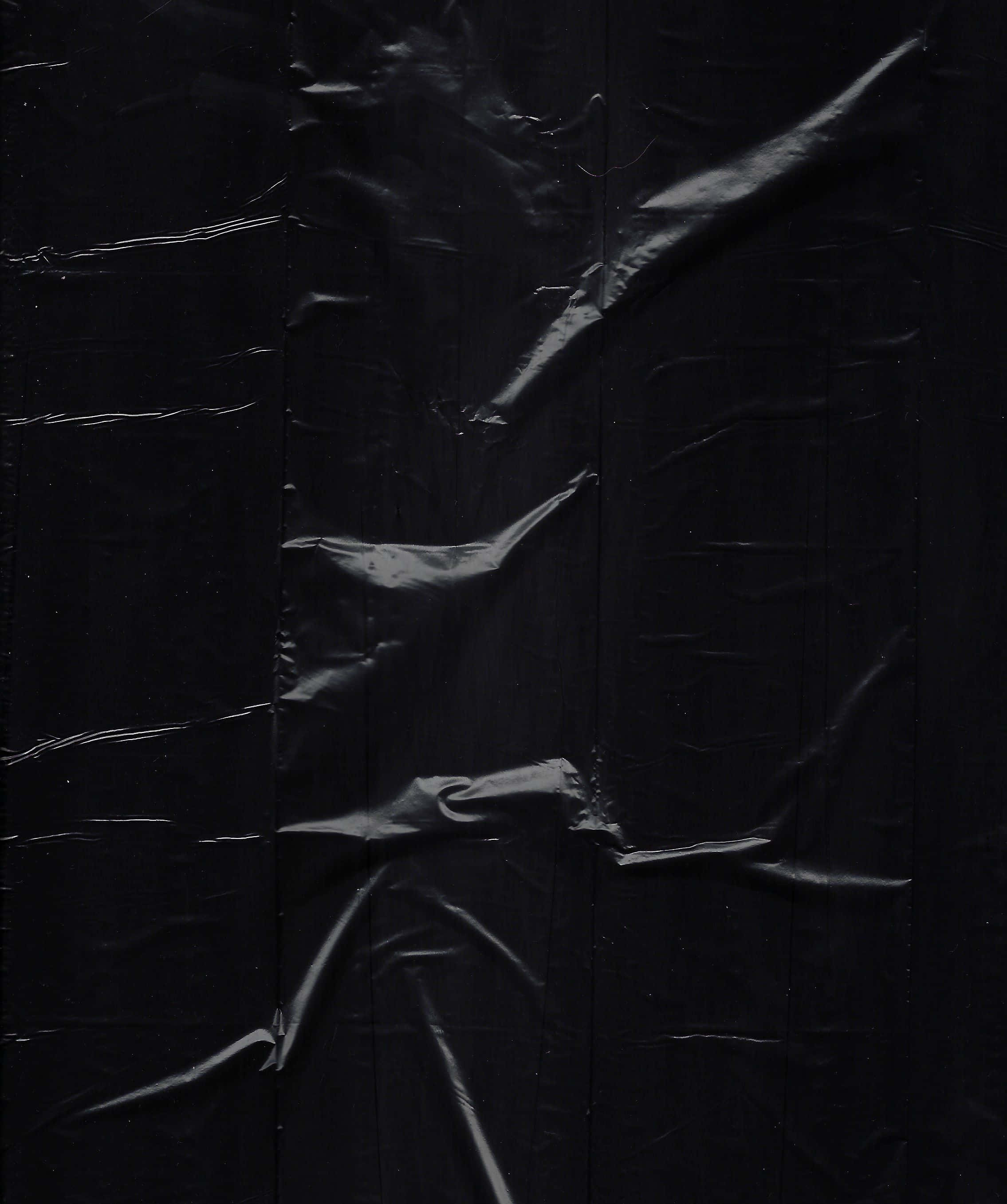 black plastic, crumpled, glossy highlights, 2K Phone Wallpaper
