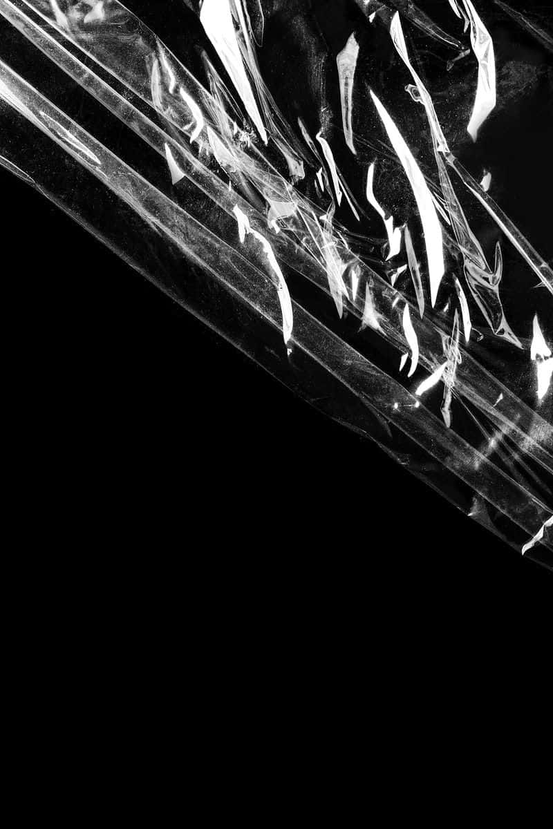 black plastic, crinkled transparent plastic film, sharp highlights, SD Phone Wallpaper