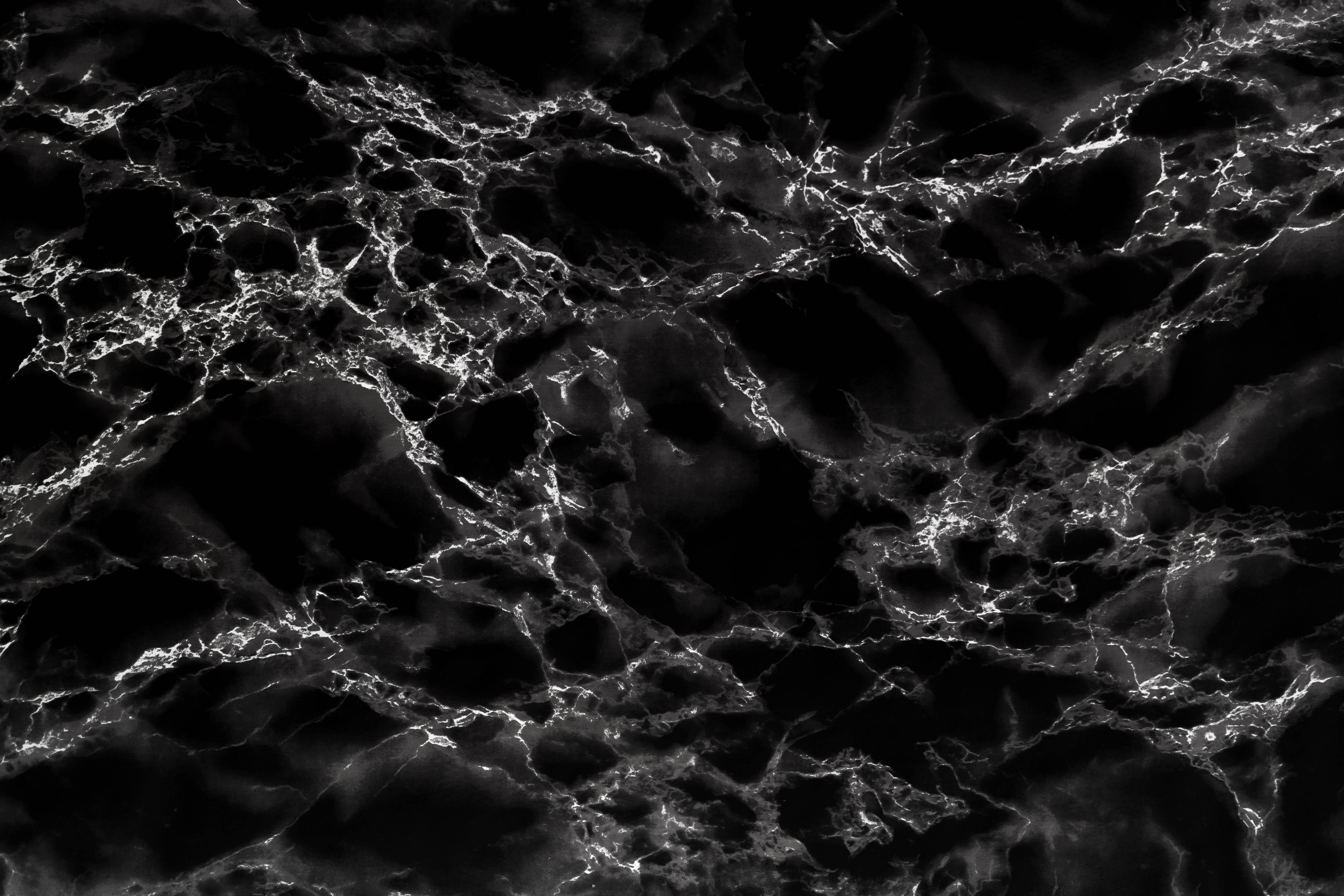 black aesthetic marble stone background, glowing white veins, intricate web-like pattern, 4K Desktop Wallpaper