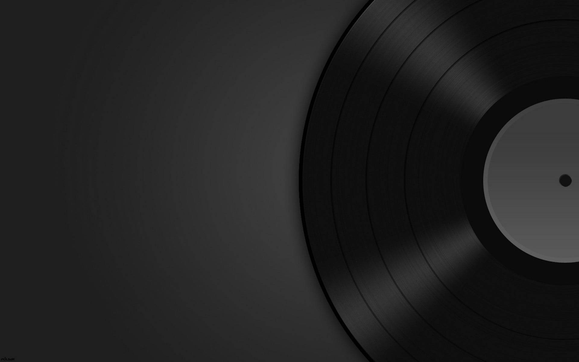 classic black vinyl record, concentric grooves, dark gray background, Full HD Desktop Wallpaper
