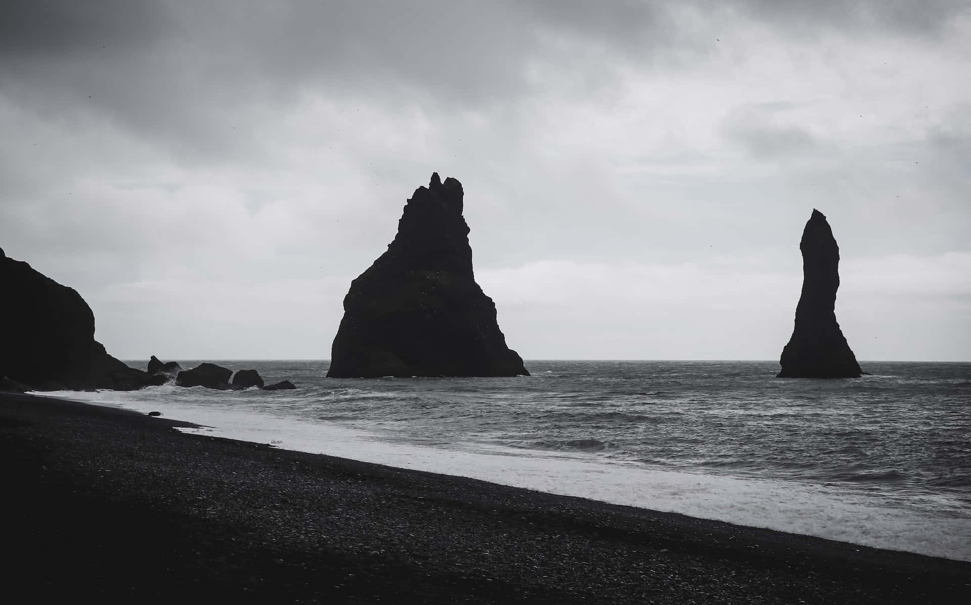 black volcanic beach, sea stacks, heavy overcast sky, Full HD Desktop Wallpaper