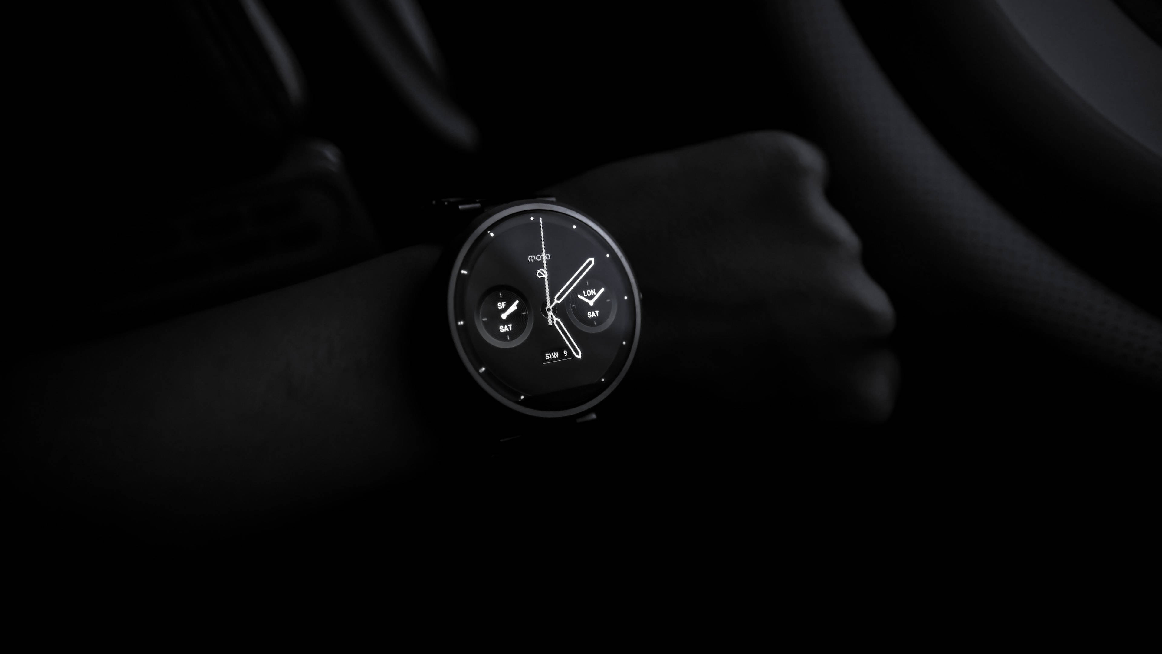 black smartwatch, dimly lit car interior, wrist, 4K Desktop Wallpaper