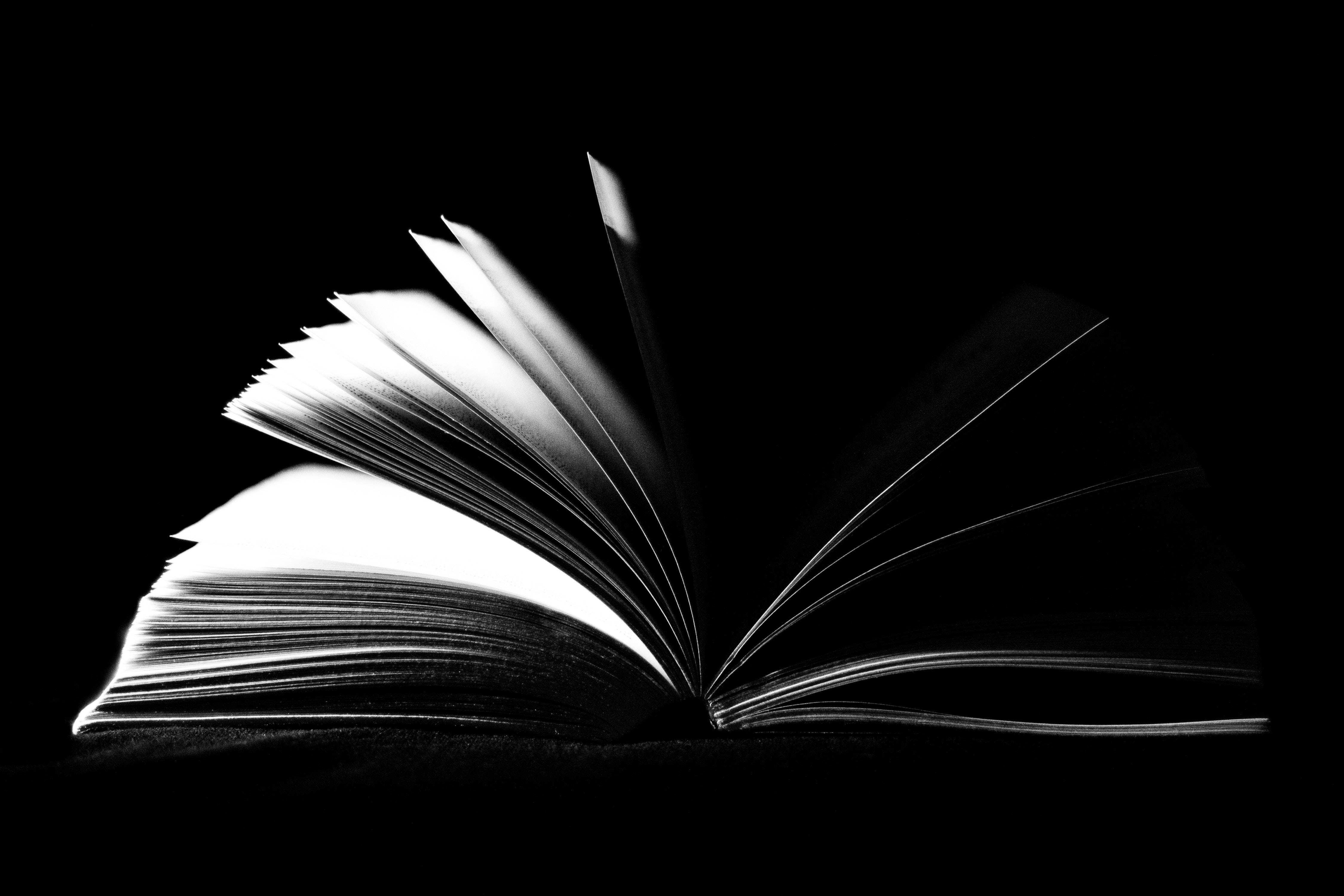 Black Screen 4K, open book, pages fanned out, 4K Desktop Wallpaper
