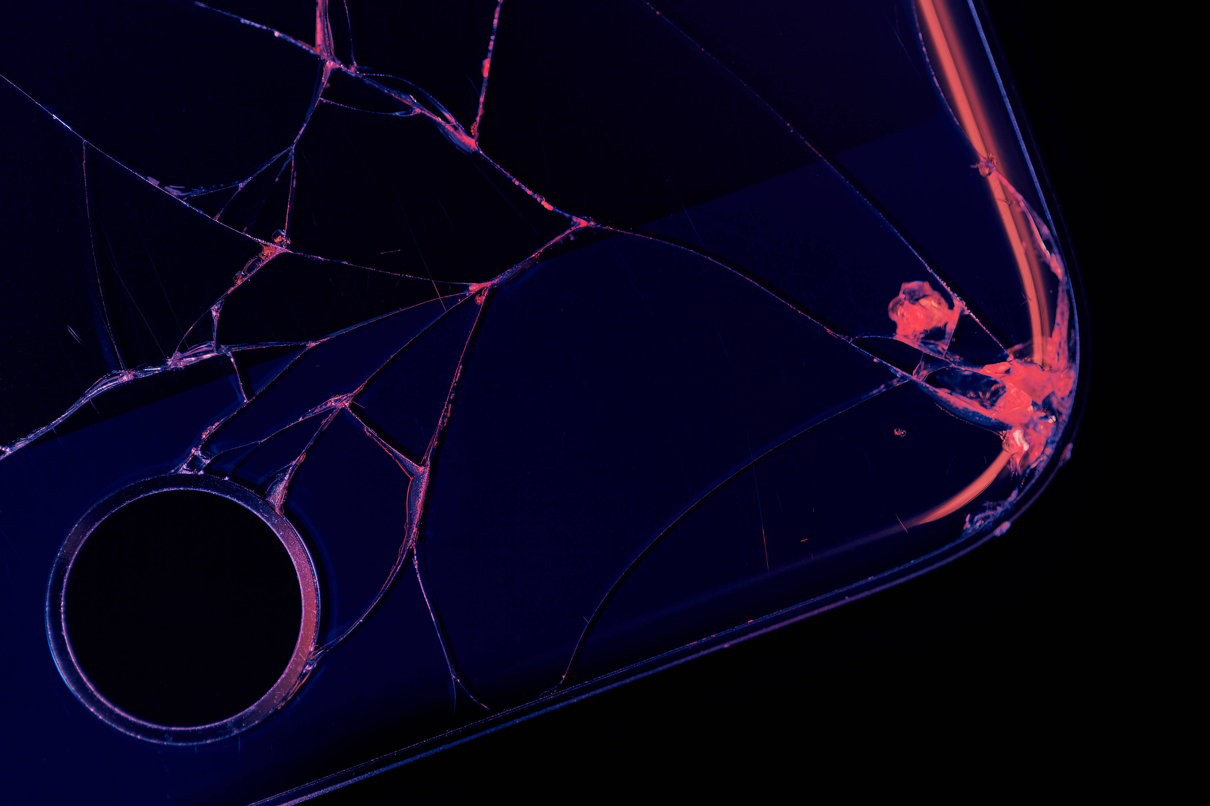 cracked smartphone screen, neon pink and blue light, black background, 4K Desktop Wallpaper