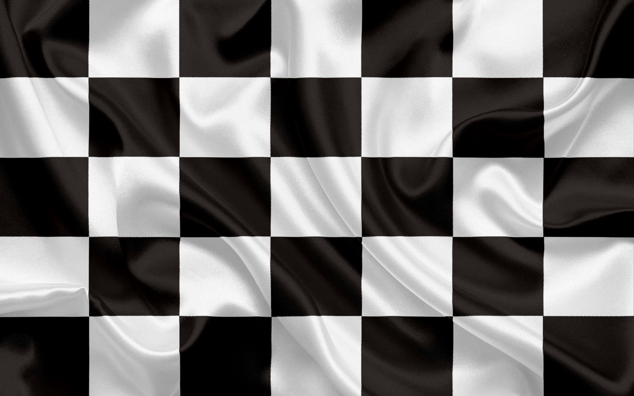 glossy black and white checkered flag, flowing fabric ripples, glossy finish, 2K Desktop Wallpaper