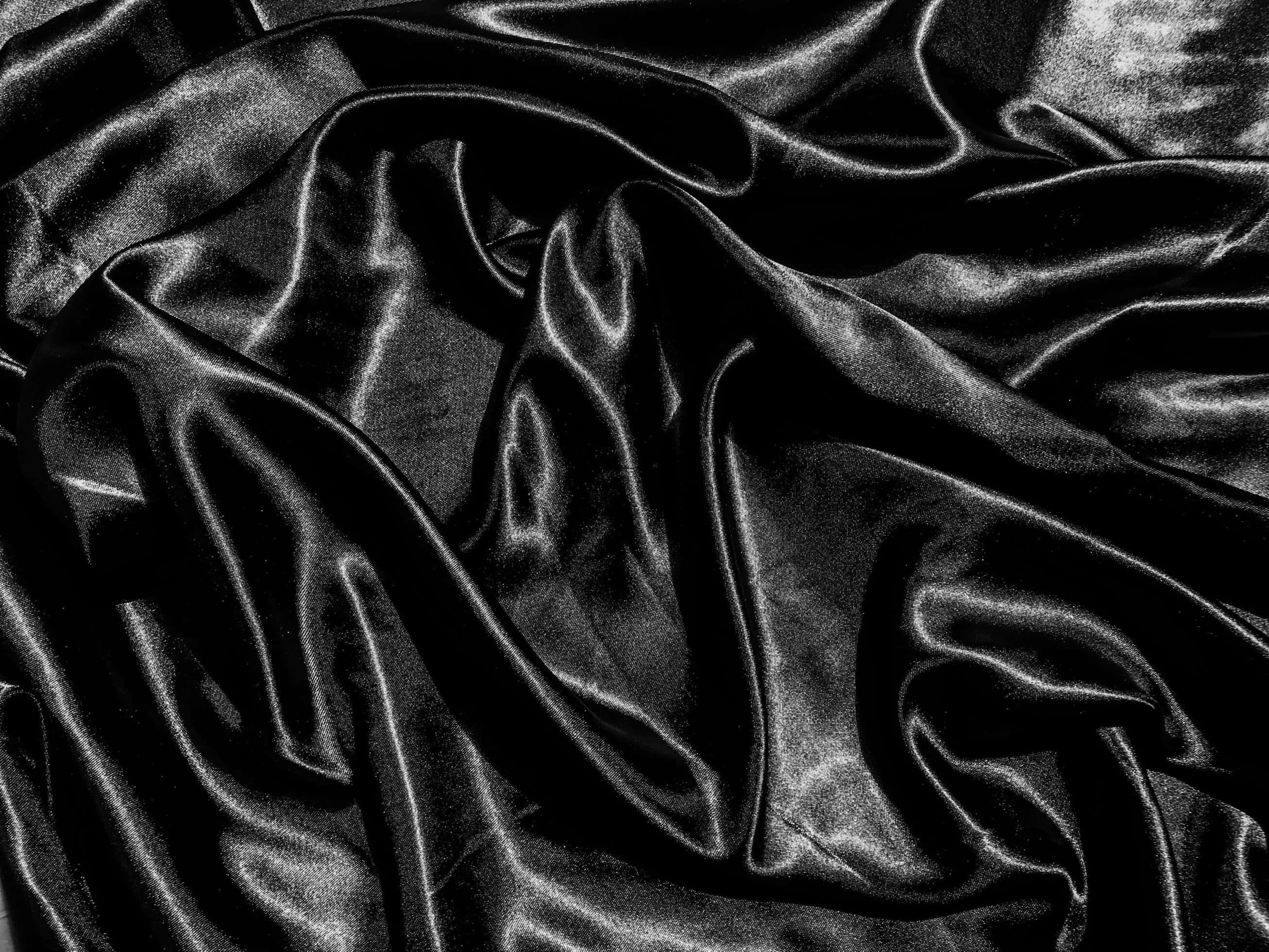 elegant black silk texture, black satin fabric, glossy folds, 2K Desktop Wallpaper