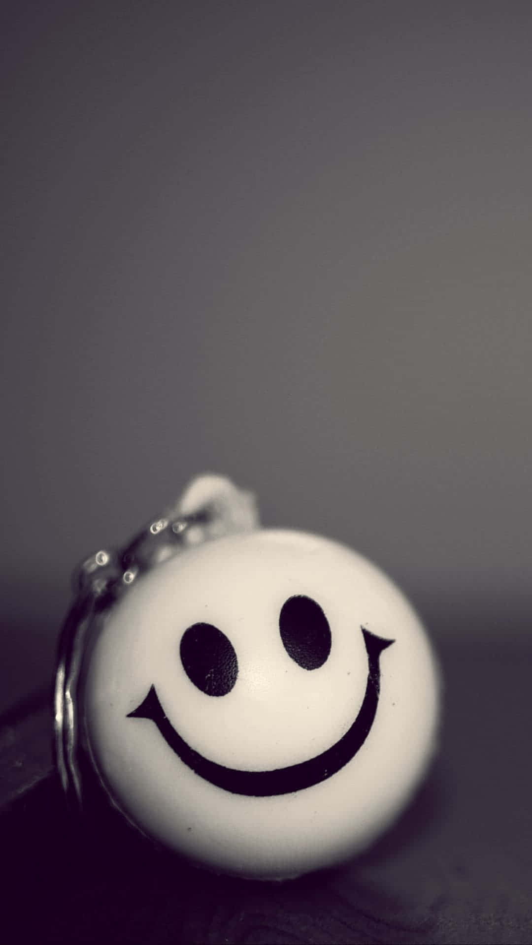 black key chain smile, white smiley face, black eyes, Full HD Phone Wallpaper