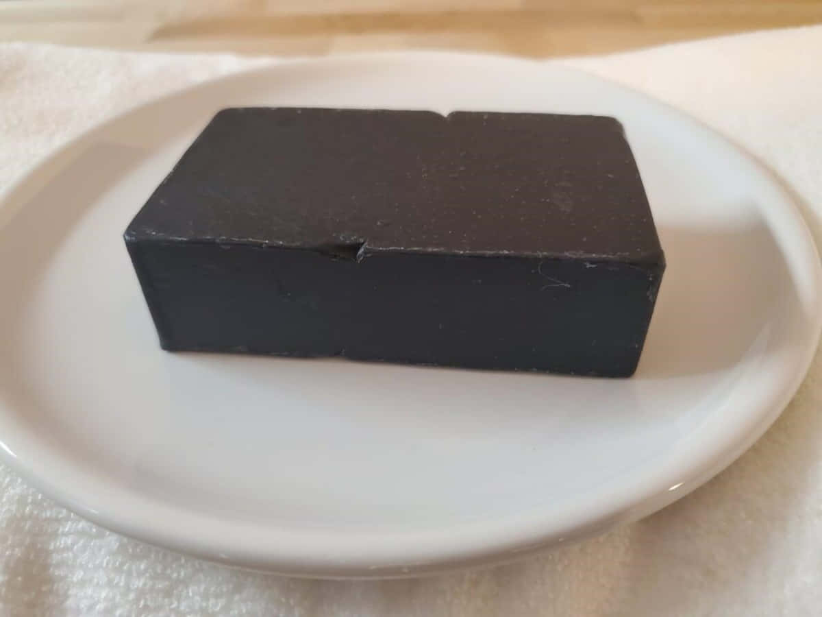 Black Soap, black rectangular bar of soap, white ceramic dish, SD Desktop Wallpaper