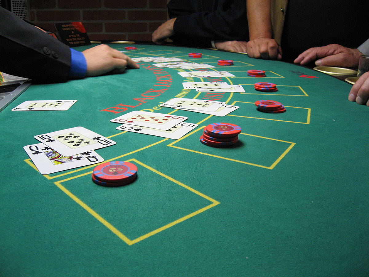green blackjack table, scattered playing cards, red poker chips, SD Desktop Wallpaper