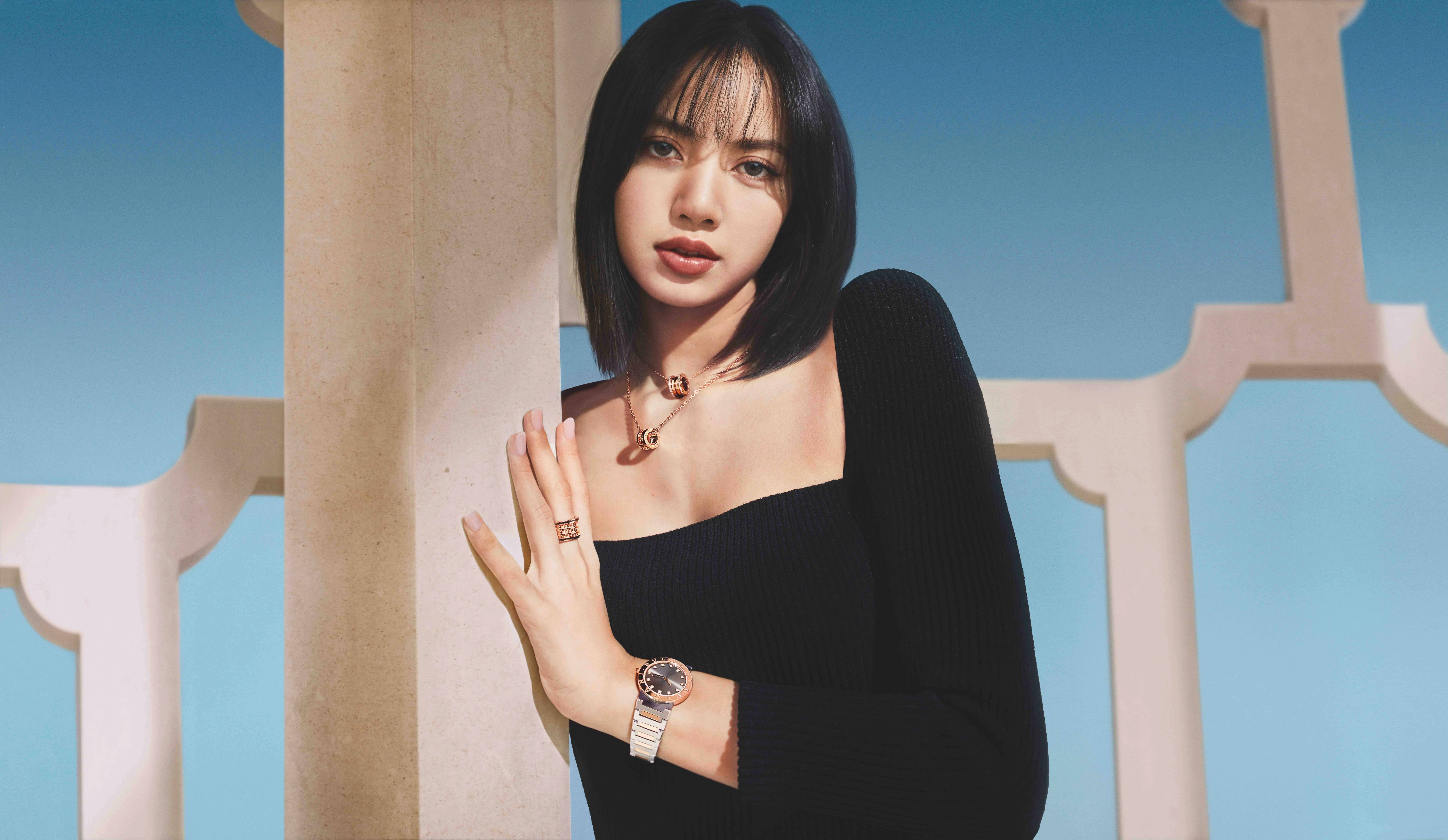 Lisa K, black ribbed top, beige pillars, 8K Desktop Wallpaper