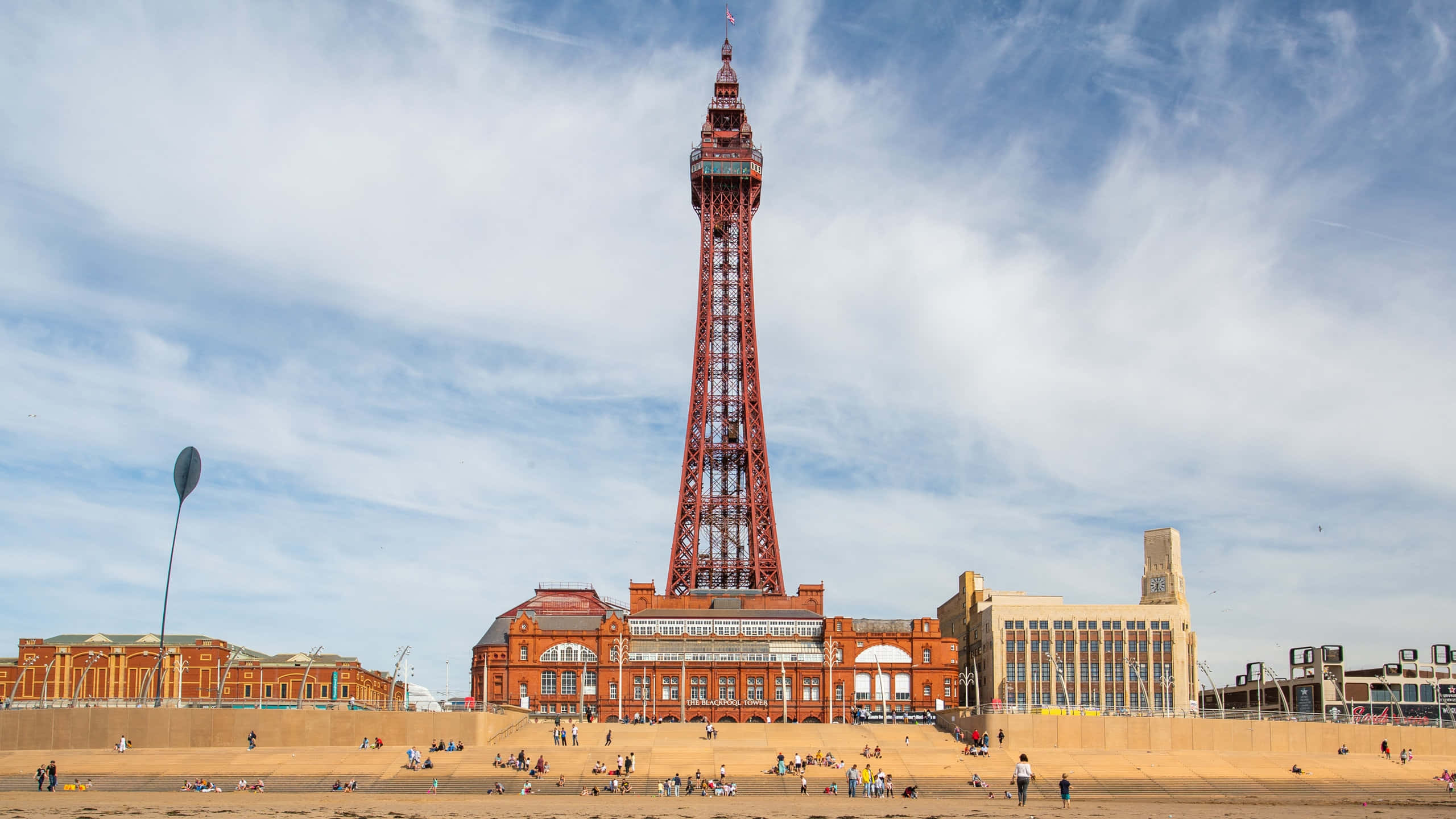Blackpool Tower, partly cloudy sky, sandy beach, 2K Desktop Wallpaper