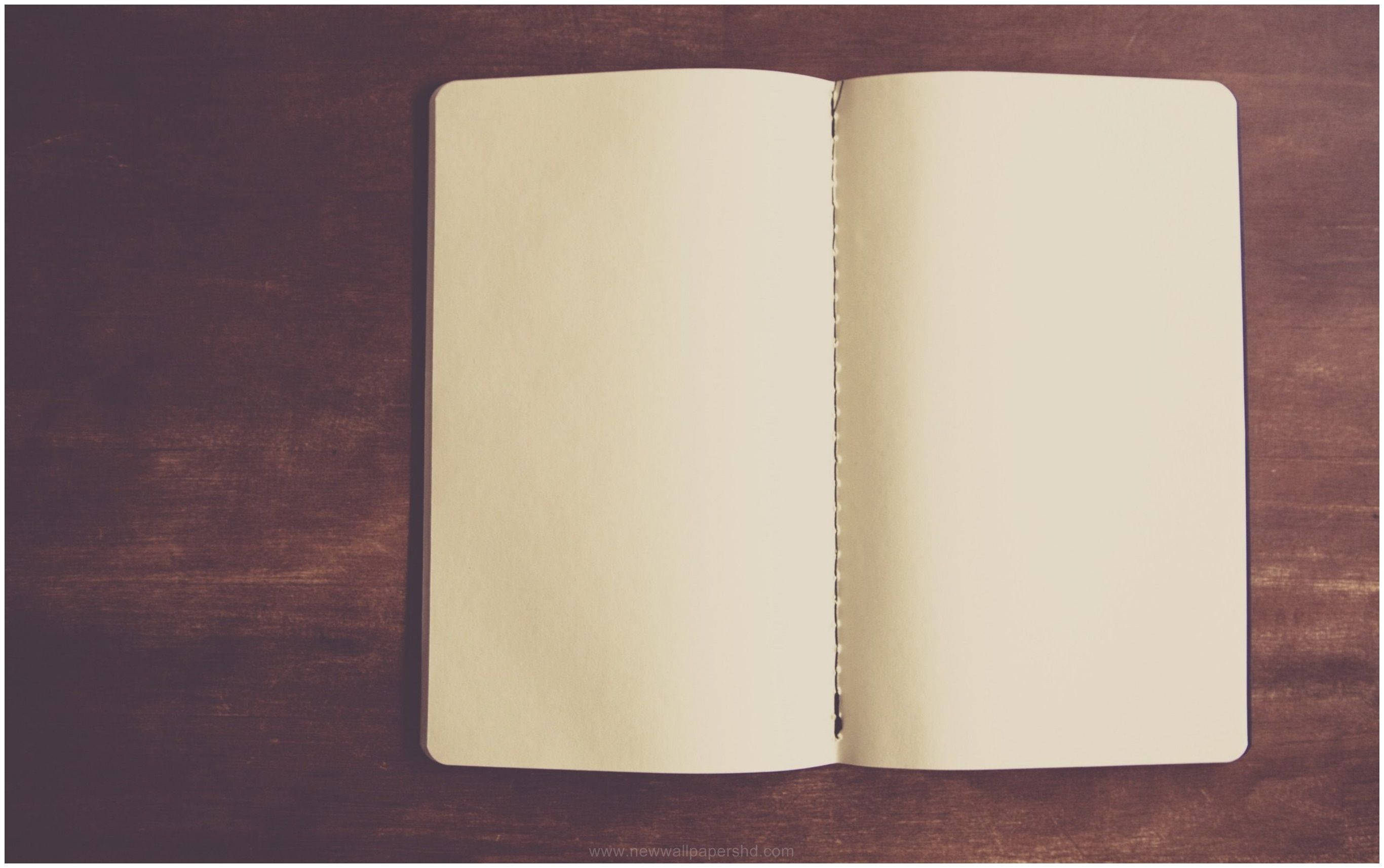 empty blank page book, open blank notebook, dark wooden surface, 2K Desktop Wallpaper