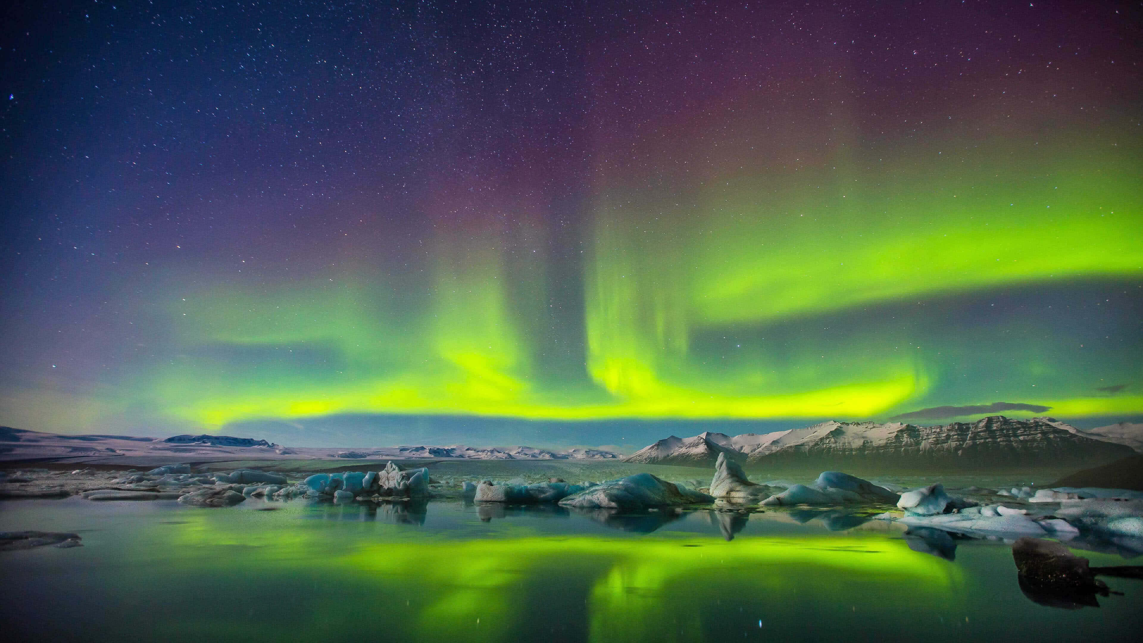 Serene Mountain Landscape Wallpaper, vibrant green aurora borealis, starry sky, 4K Desktop Wallpaper