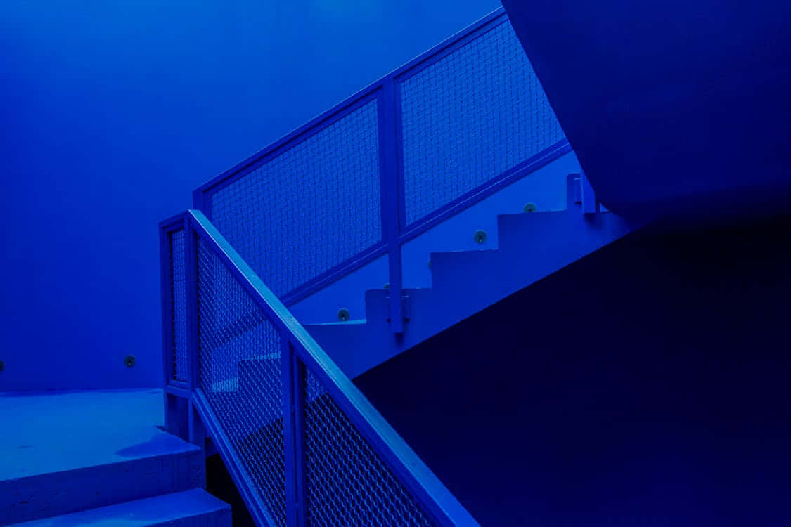 blue neon staircase aesthetic, metal mesh railing, intense blue light, SD Desktop Wallpaper