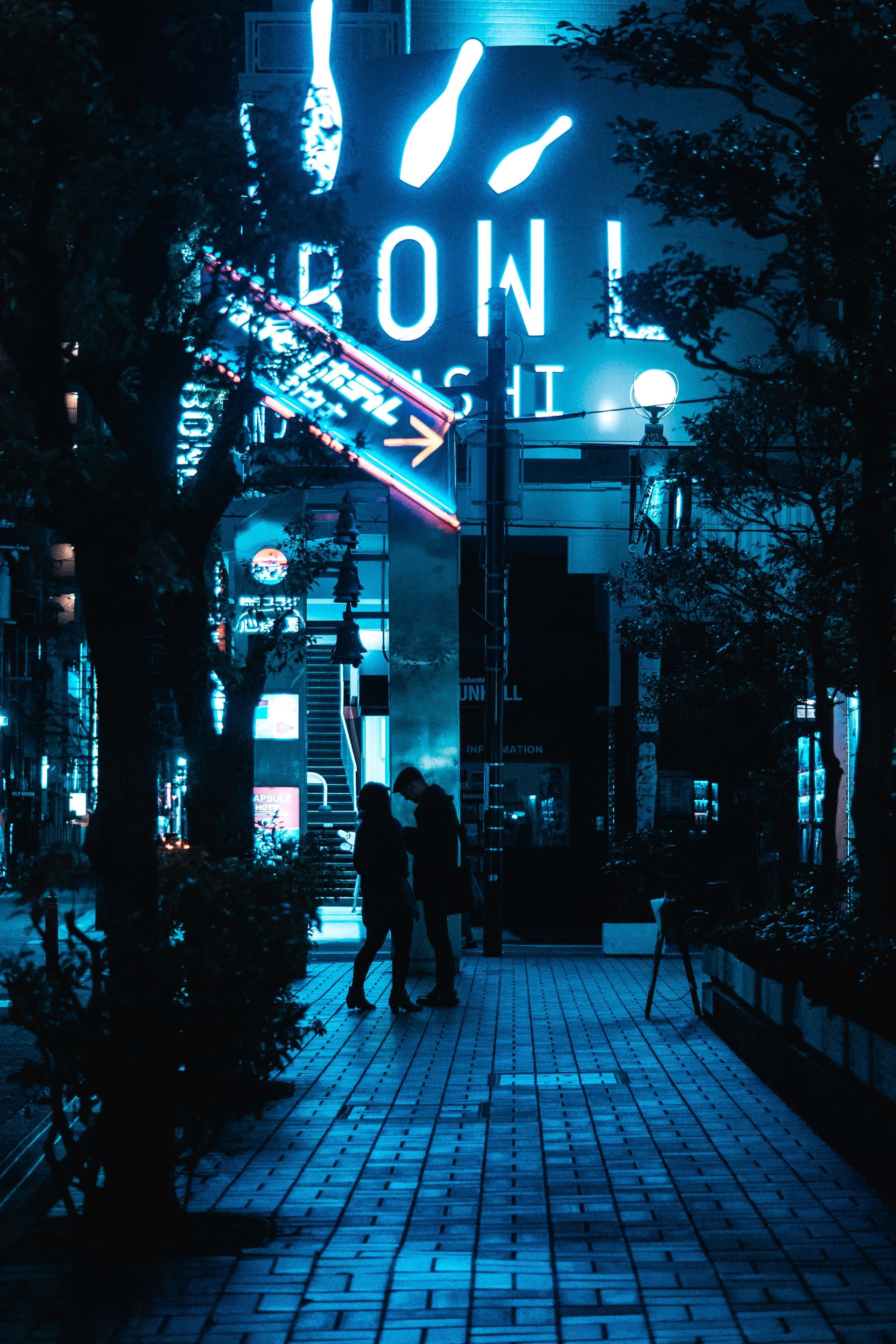 Bowl Sushi, glowing blue neon signs, quiet tiled sidewalk, 4K Phone Wallpaper