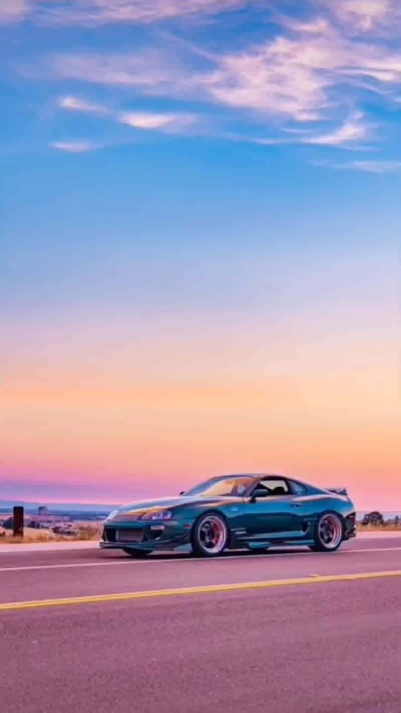teal sports car, desert highway, vibrant twilight sky, HD Phone Wallpaper