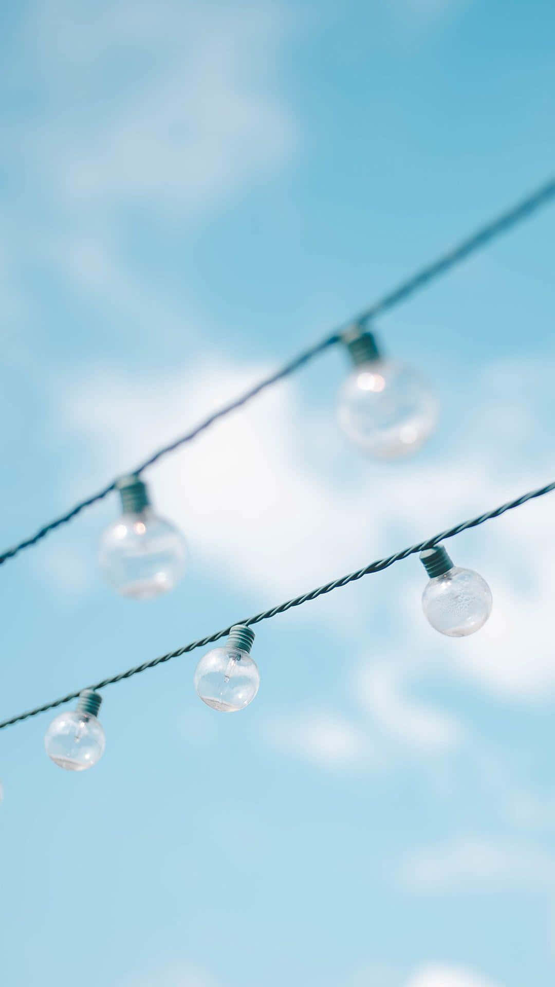 blue sky, clear glass globe lights, wispy white clouds, Full HD Phone Wallpaper