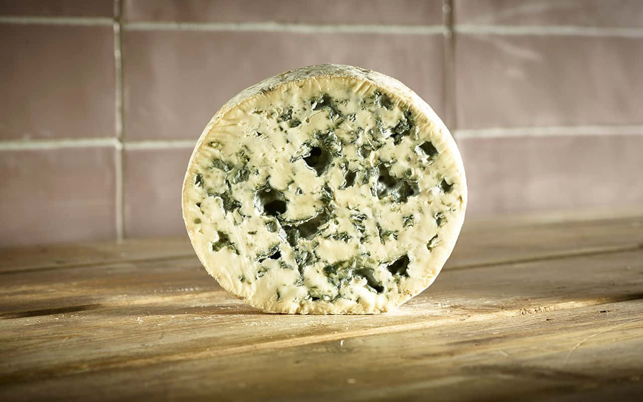 blue cheese, greenish veins, wooden surface, HD Desktop Wallpaper
