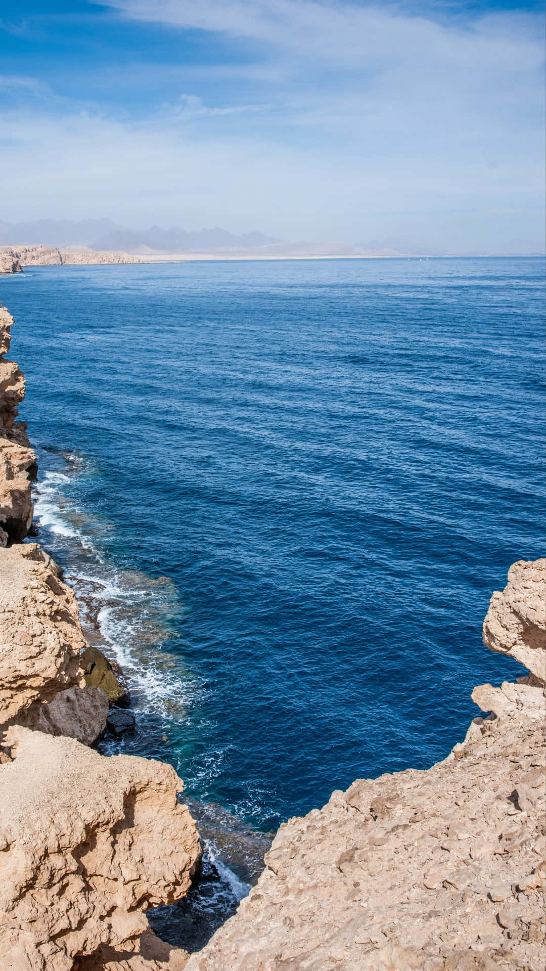 rocky cliff, blue ocean, tan cliffs, Full HD Phone Wallpaper