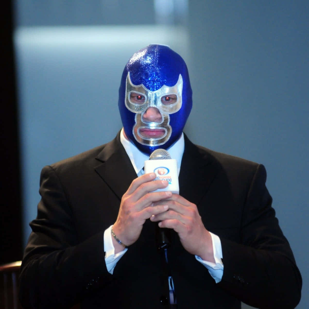 Blue Demon, glittering blue and silver mask, formal black suit, SD Desktop Wallpaper