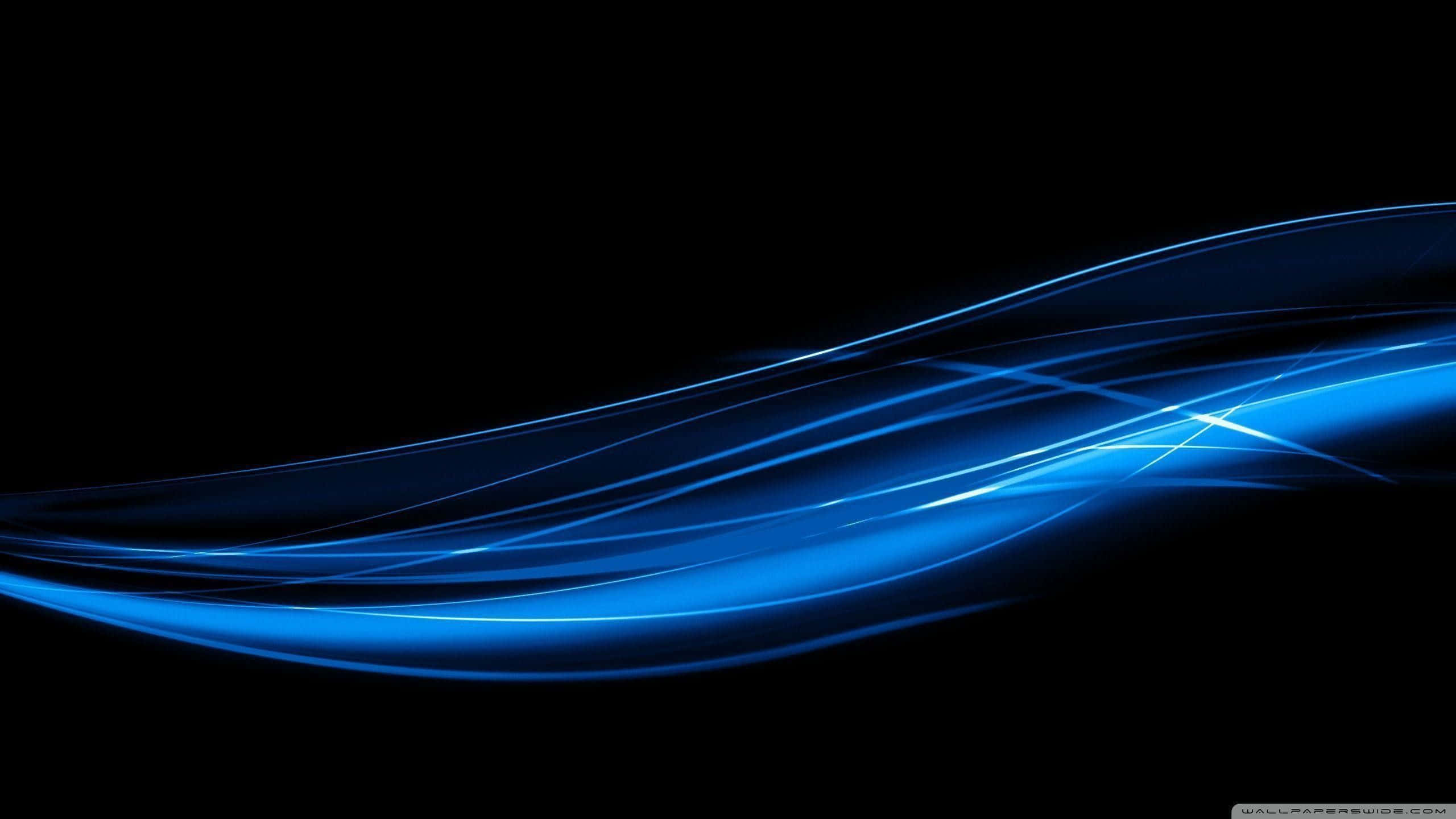 blue desktop, vibrant blue light trails, deep black background, 2K Desktop Wallpaper