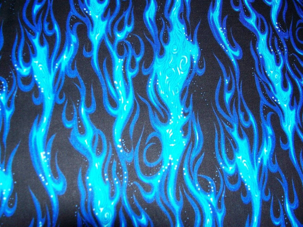 blue fire flames, vibrant electric blue flame patterns, dark fabric surface, SD Desktop Wallpaper