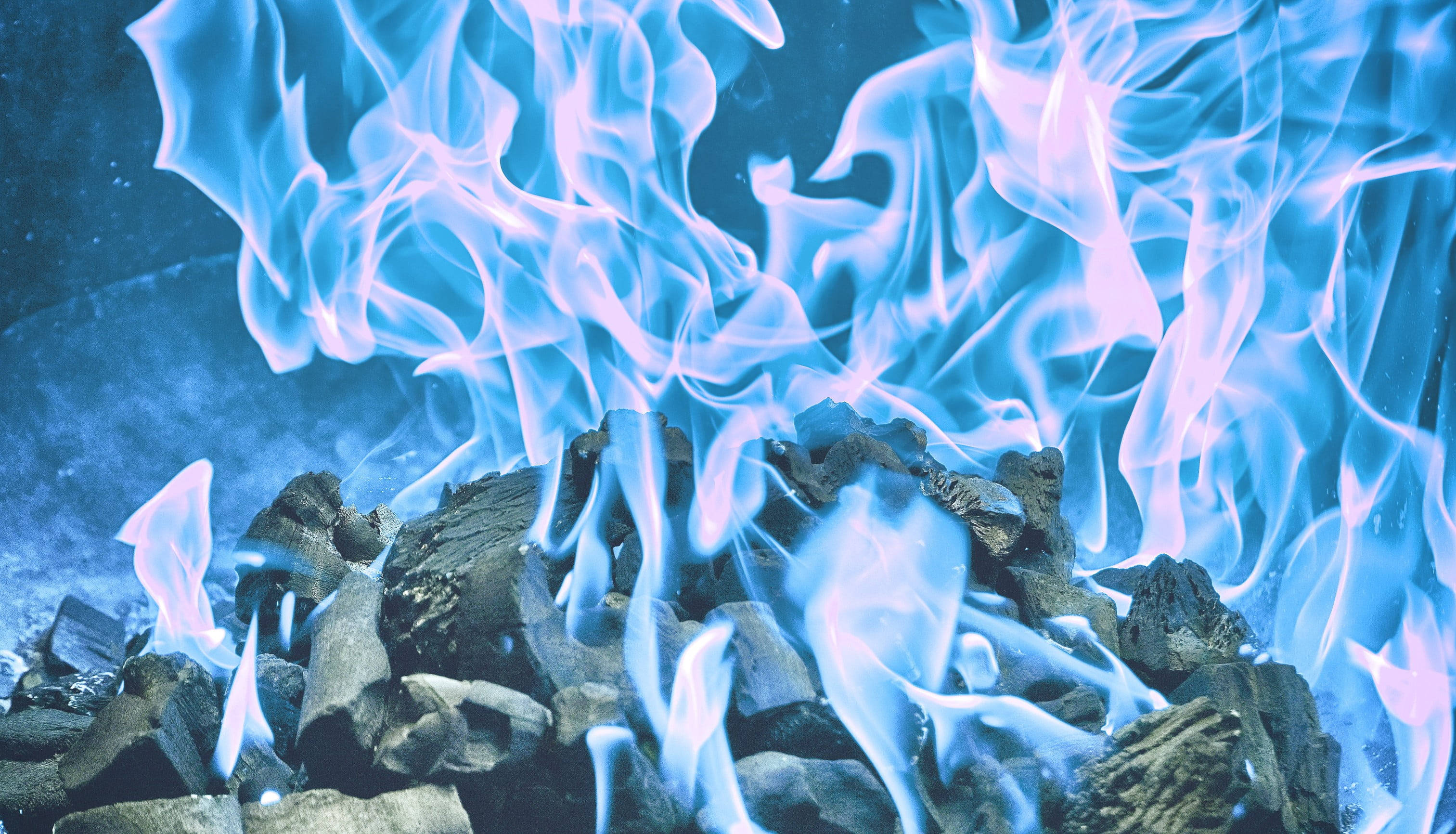 charcoal blue flames, vivid blue flames, dark charred wood embers, 2K Desktop Wallpaper