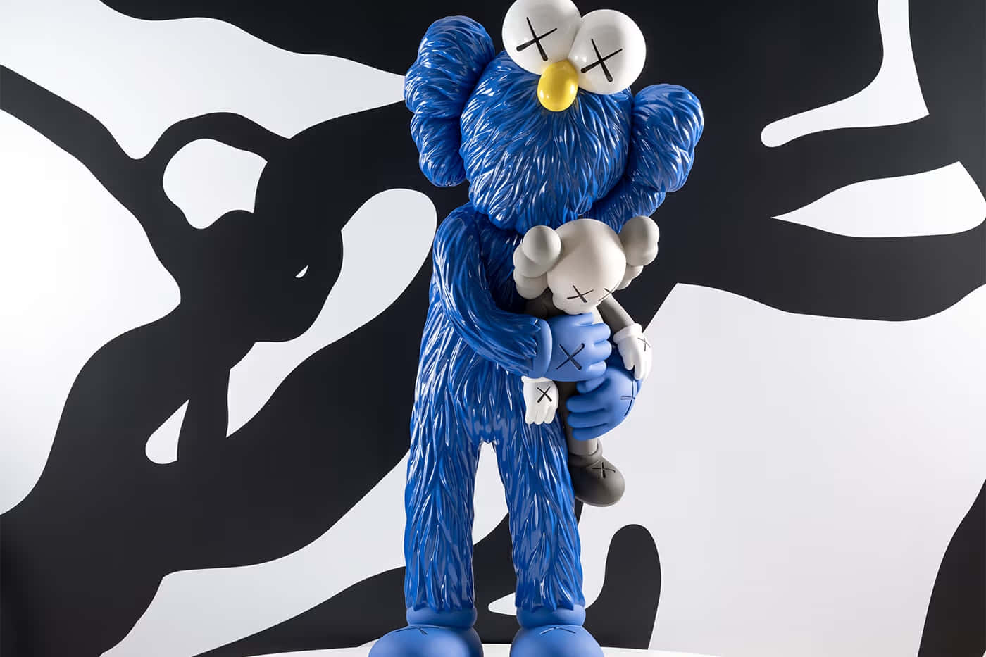 Blue Kaws, smaller gray KAWS figure, bold black and white abstract wall, HD Desktop Wallpaper