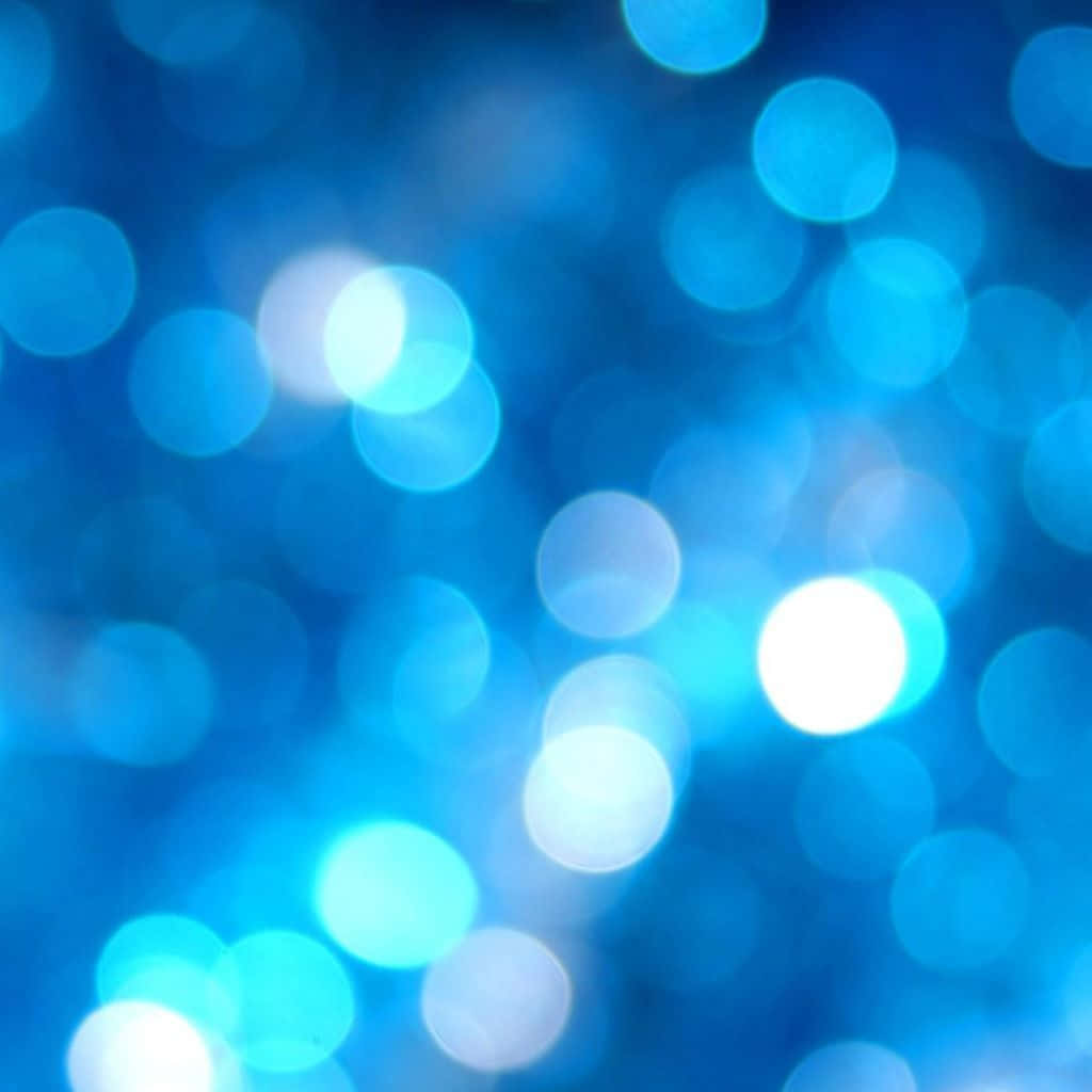 Blue Christmas LED Circles, glowing blue bokeh lights, deep blue background, SD Desktop Wallpaper