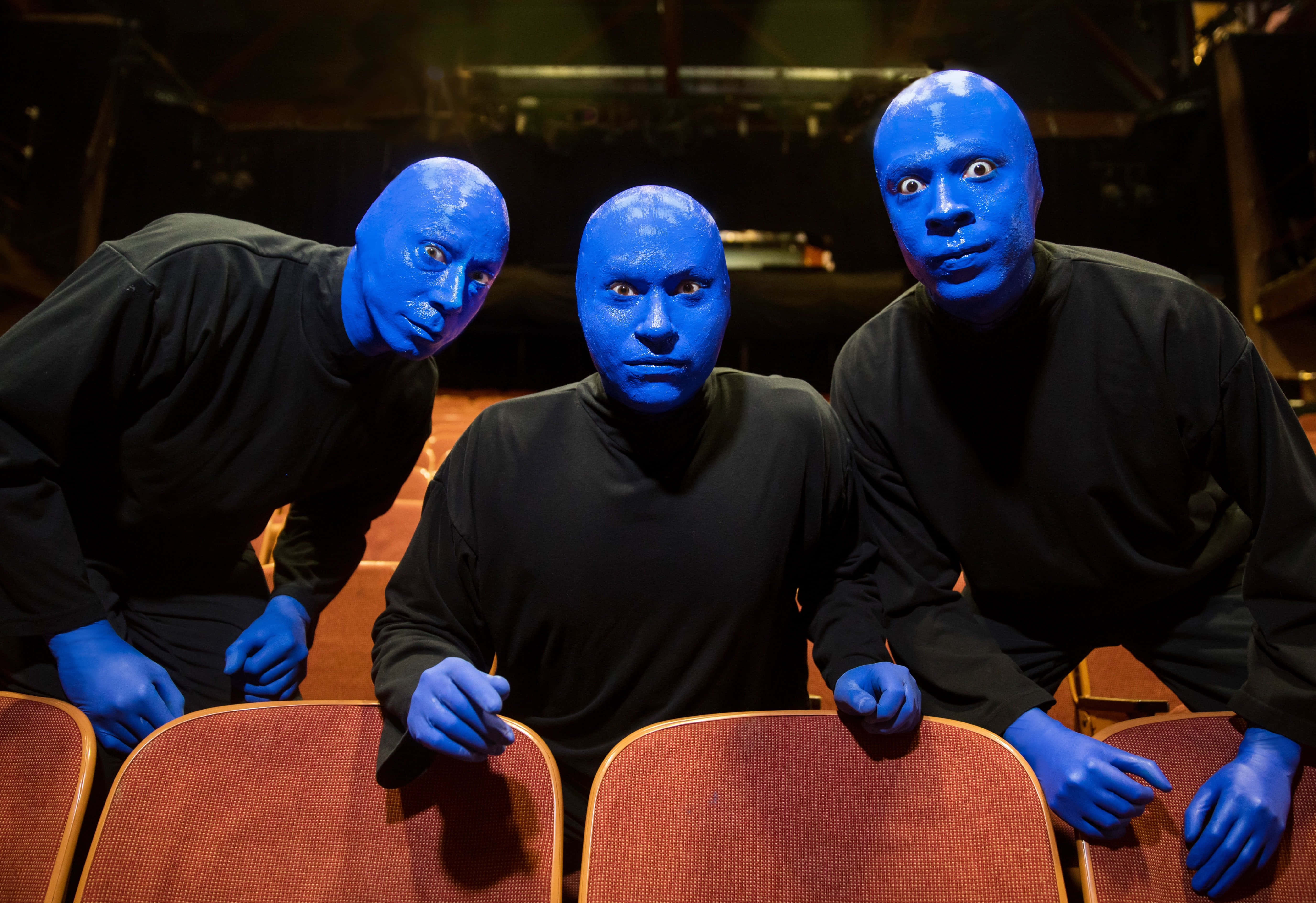 Blue Man Group, blue face and hand paint, red theater seats, 5K Desktop Wallpaper