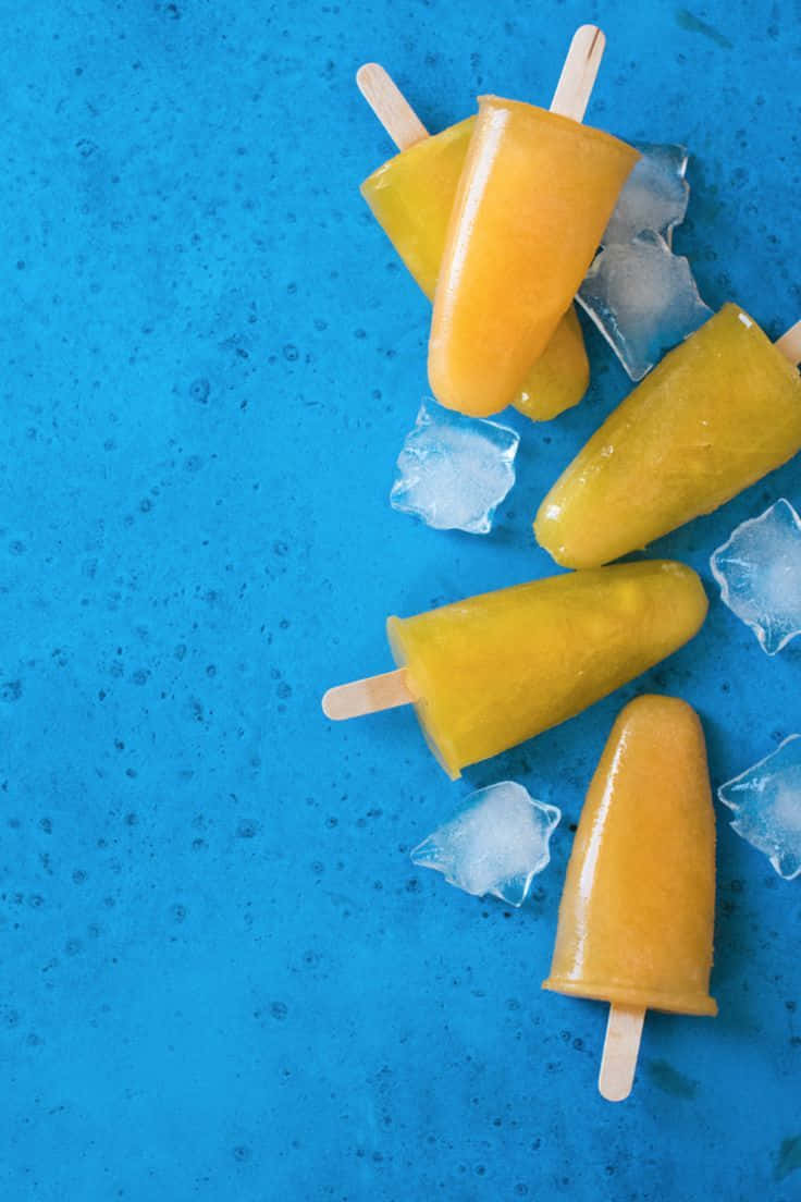 Blue Mango, yellow popsicles, wooden sticks, SD Phone Wallpaper