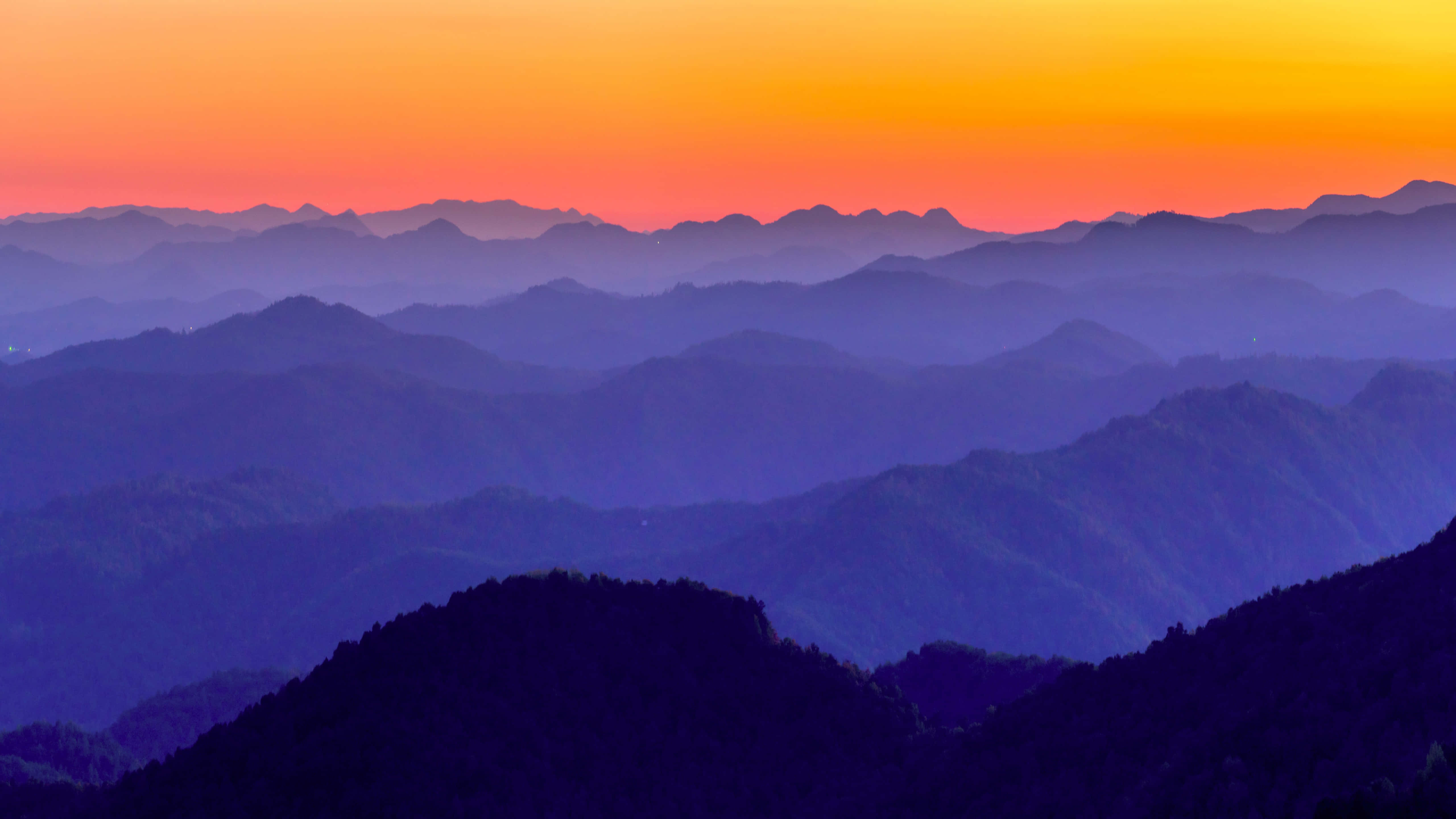Blue Mountain Aesthetic, vibrant orange sunset, layered mountain ranges, 5K Desktop Wallpaper