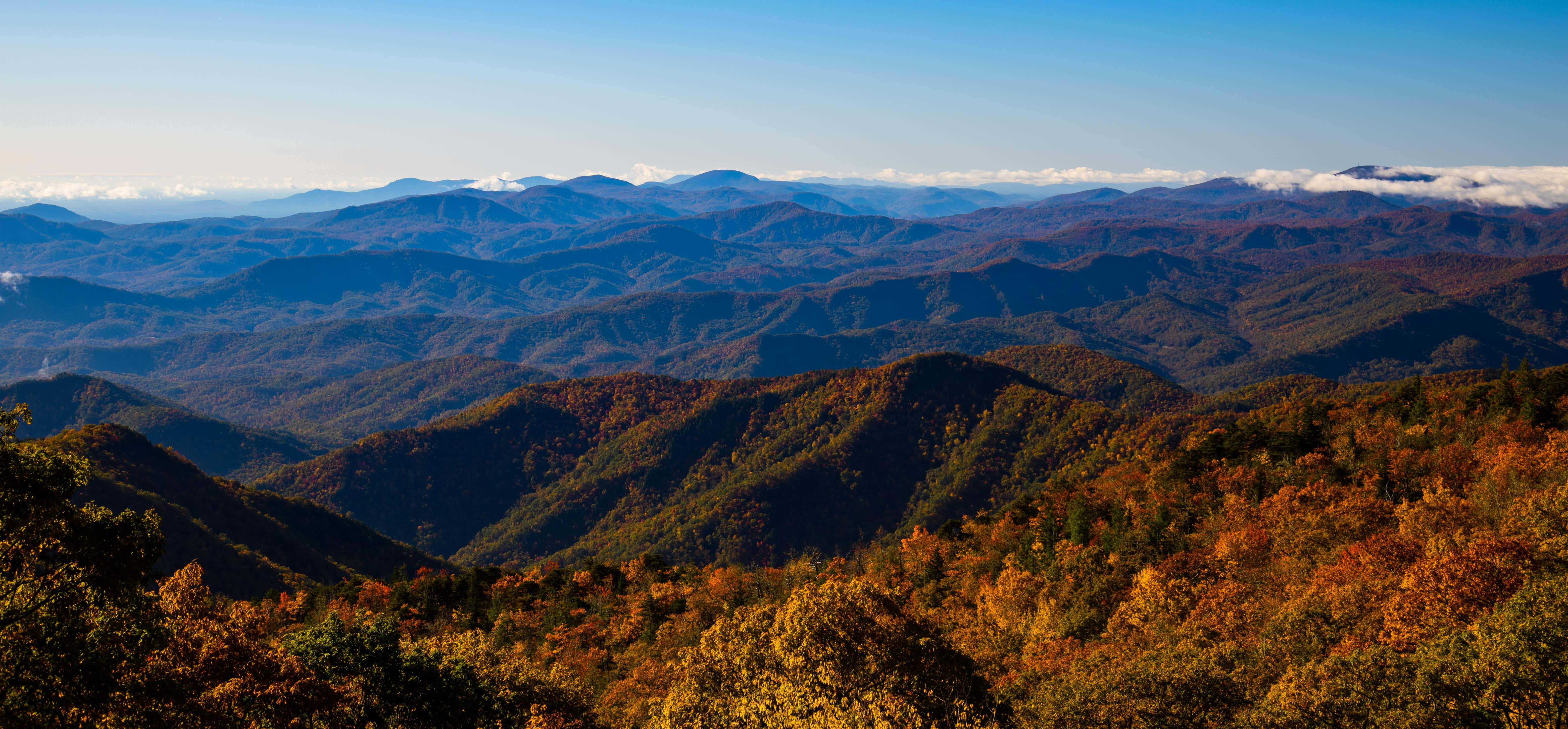 Blue Ridge Mountains, golden autumn light, layered peaks, 5K Desktop Wallpaper