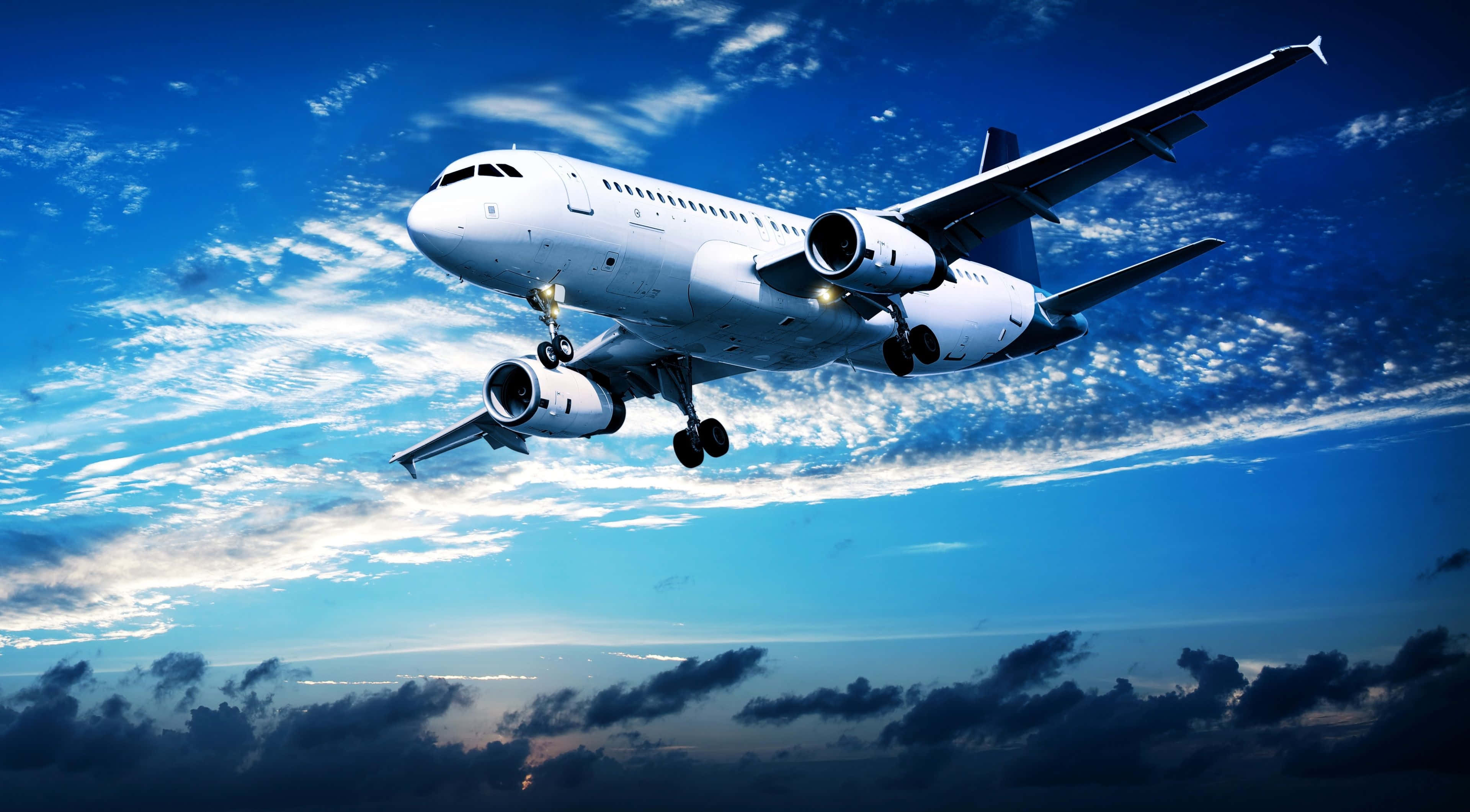 white passenger jet, vibrant blue sky, wispy clouds, 4K Desktop Wallpaper