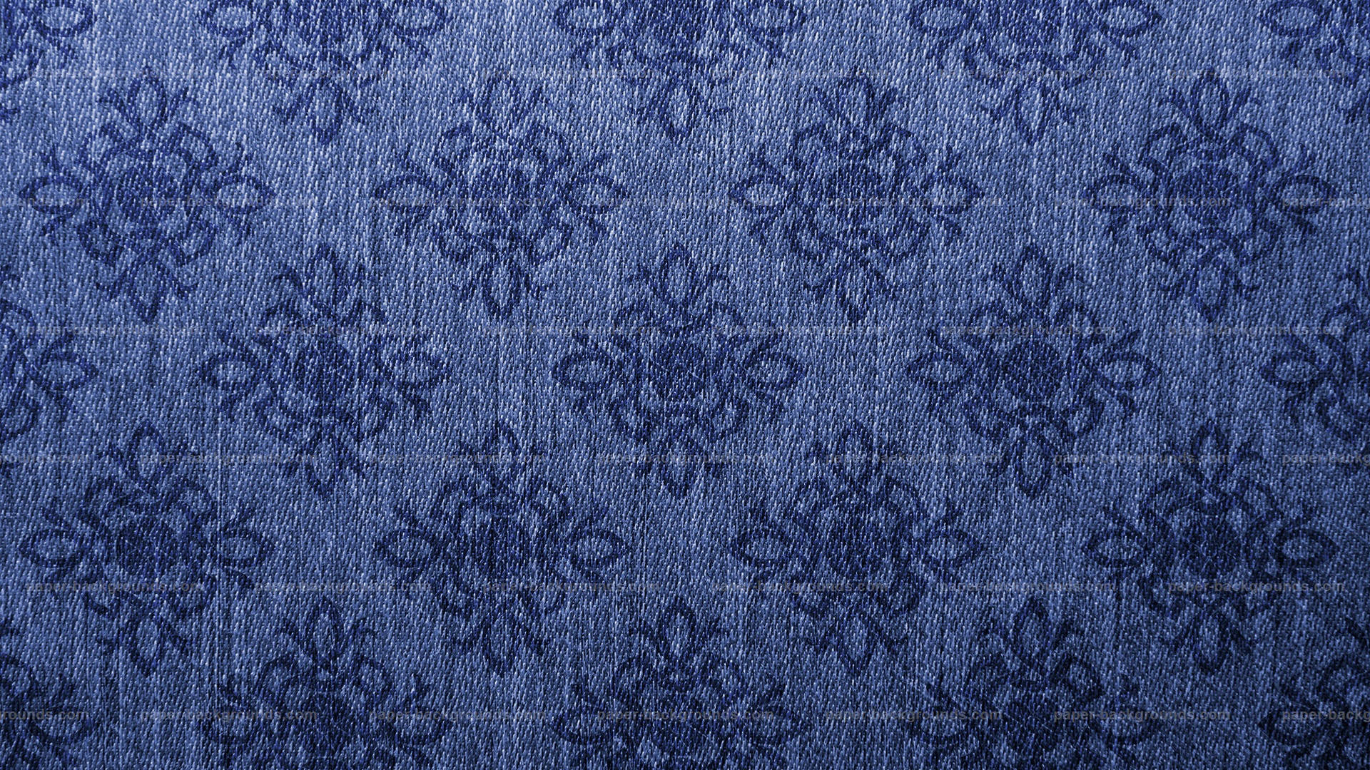 blue denim fabric, repeating dark floral embroidery pattern, close-up, Full HD Desktop Wallpaper