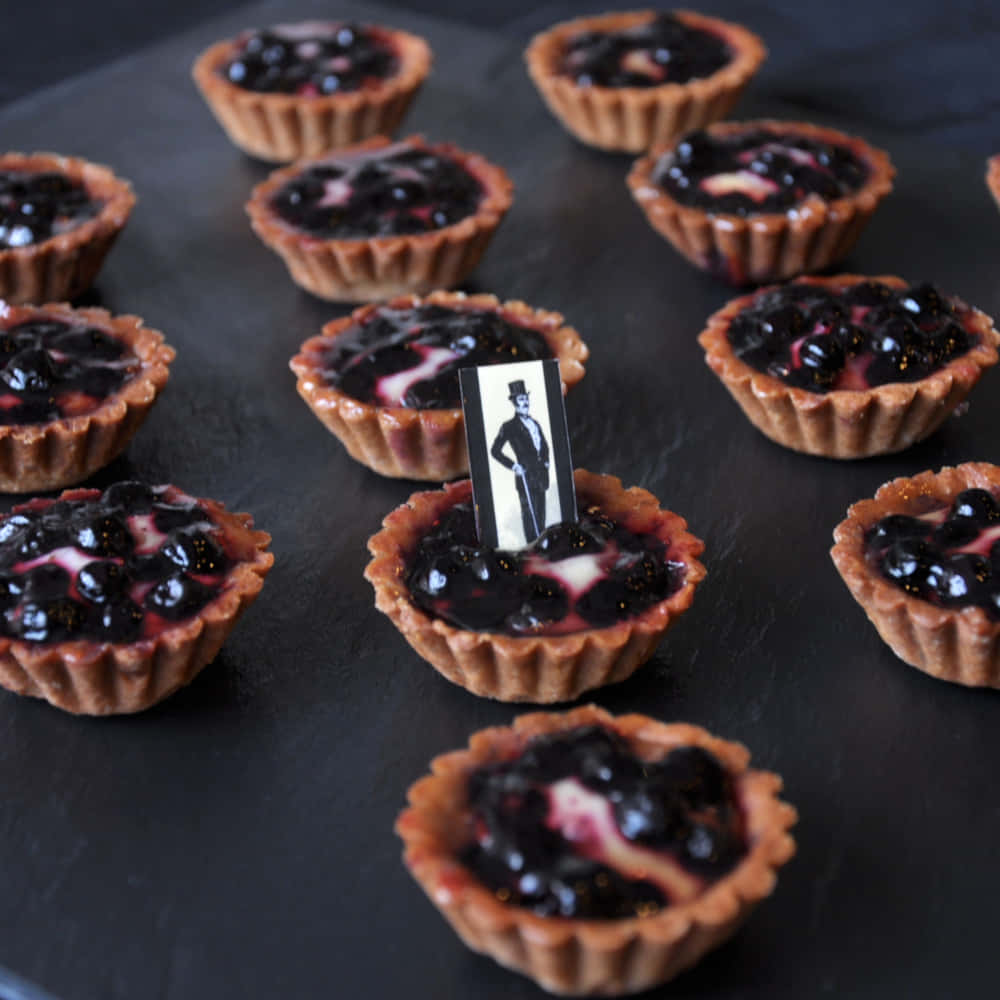 blueberries tart, glossy fruit topping, dark slate surface, SD Desktop Wallpaper