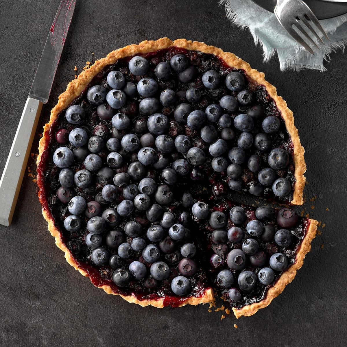 blueberries tart, golden crust, dark slate surface, SD Desktop Wallpaper