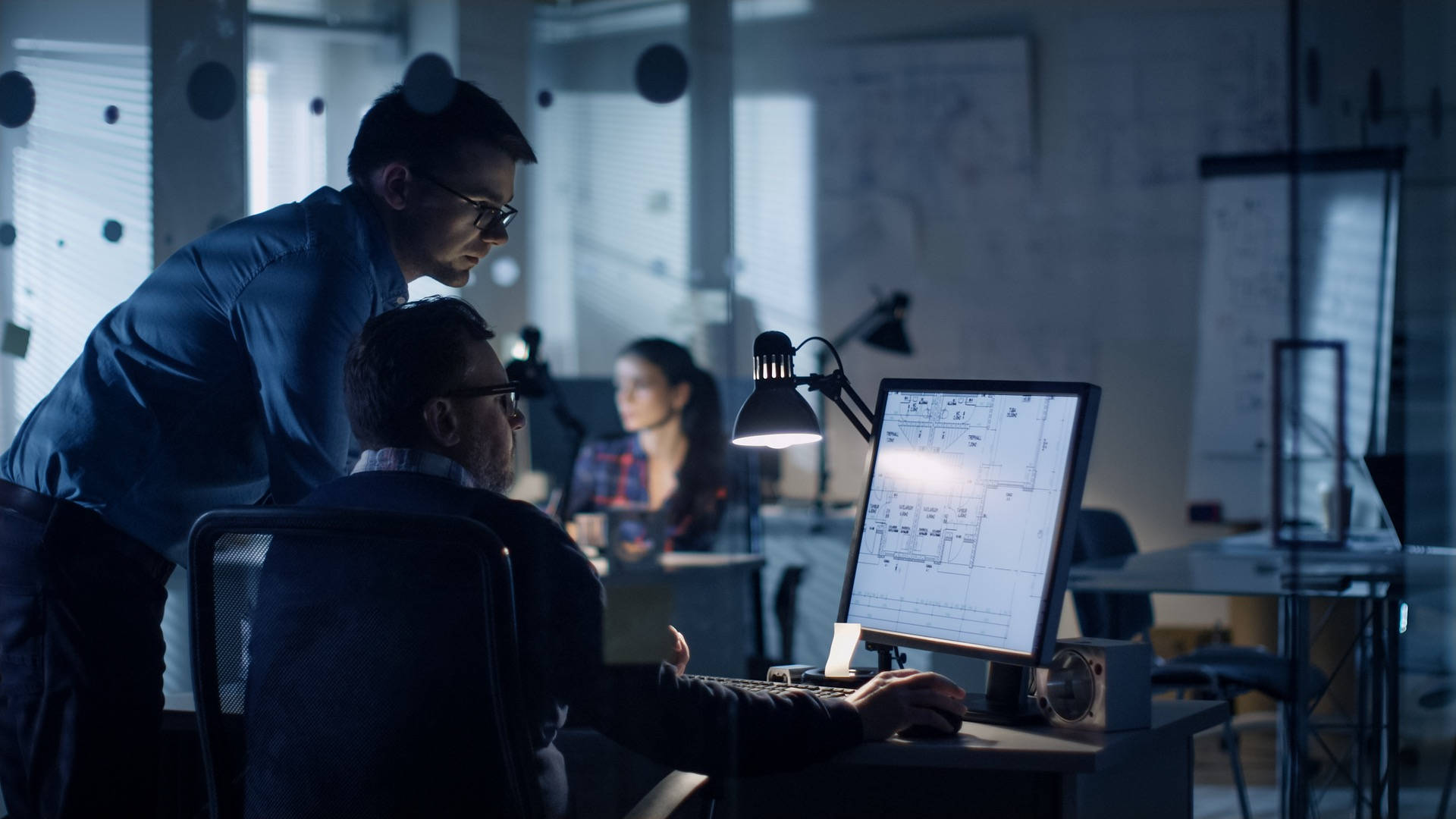 blueprints, glowing monitor, dimly lit modern office, Full HD Desktop Wallpaper