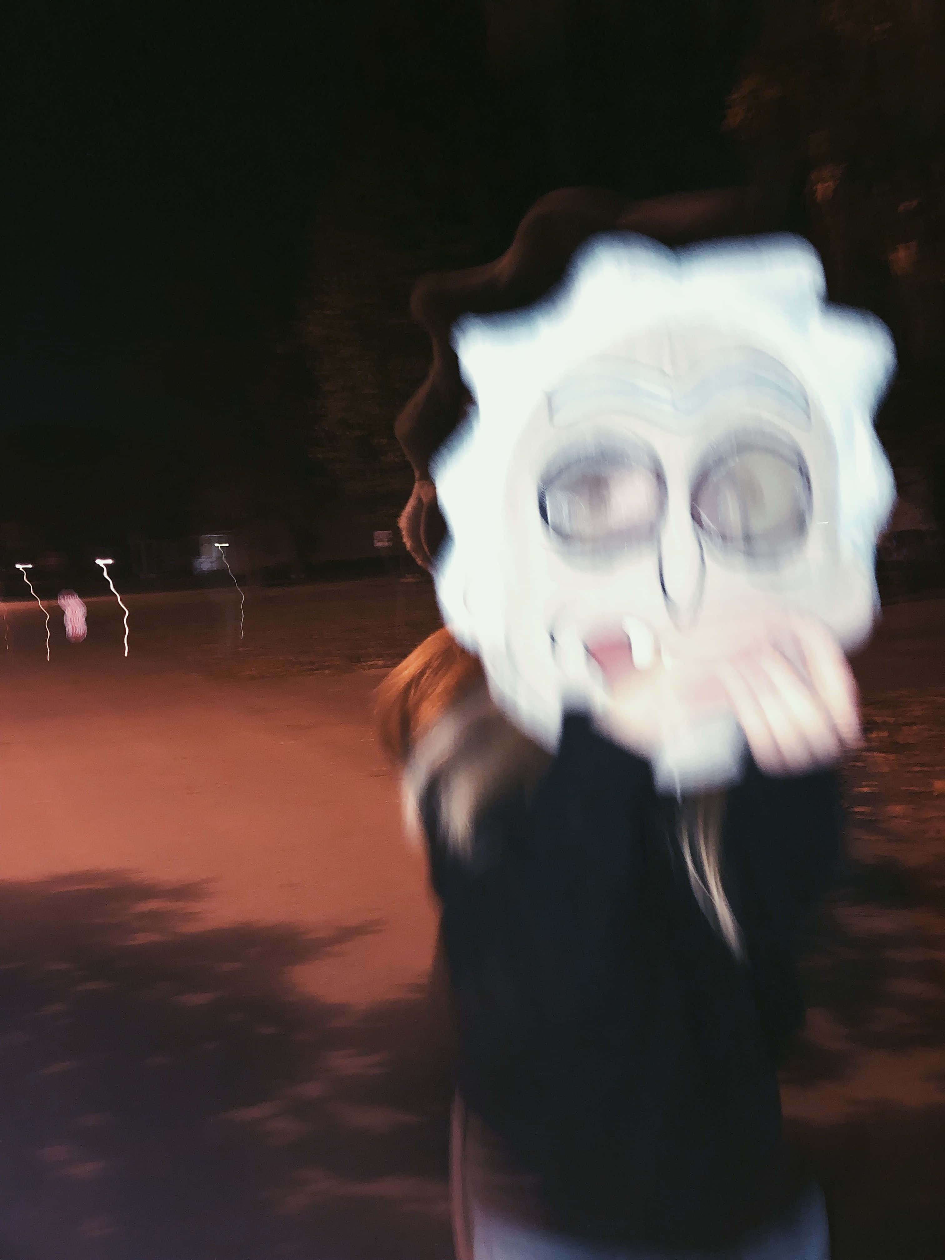 white cartoon mask, exaggerated eyes and teeth, blurred in motion, 4K Phone Wallpaper