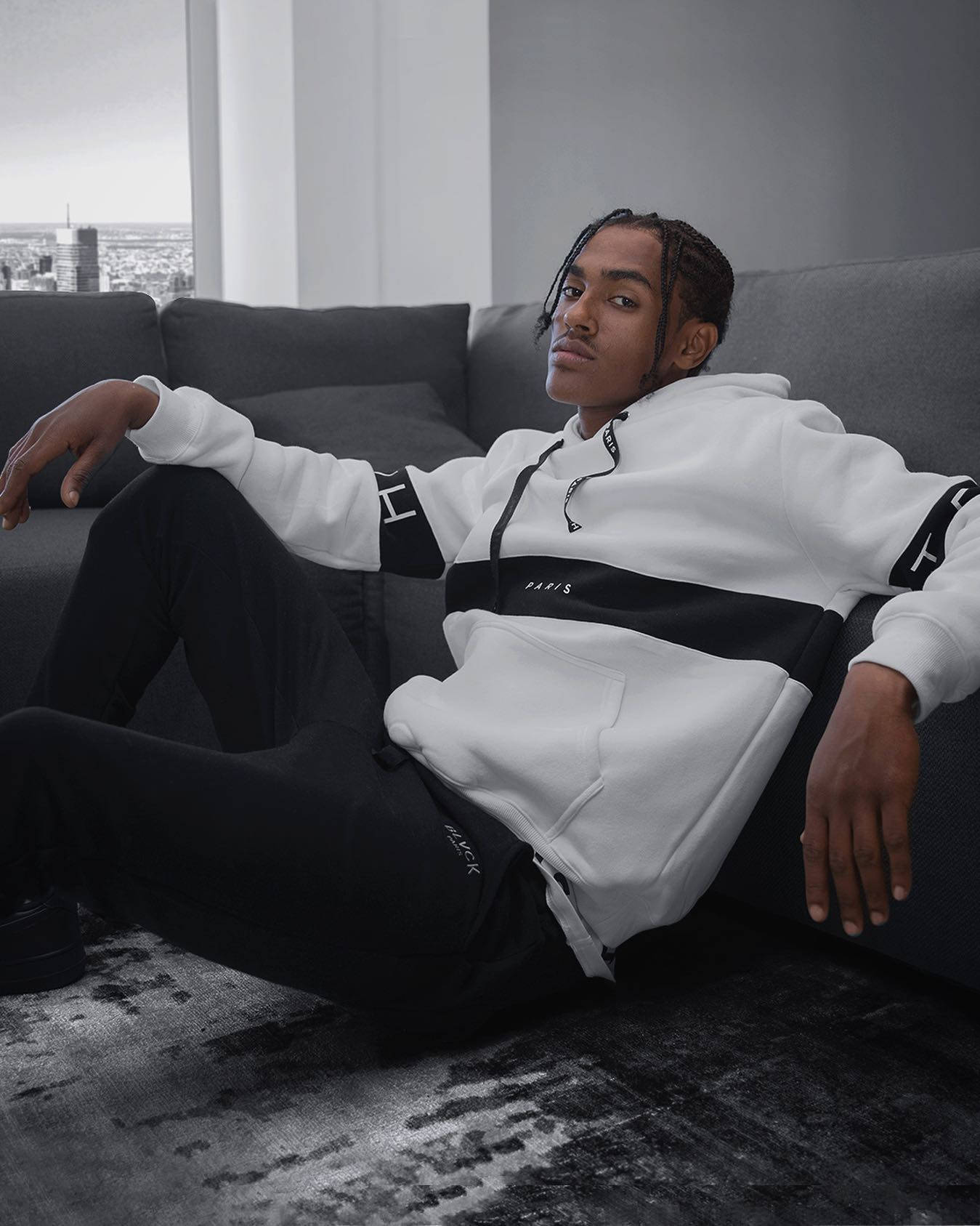 Blvck Paris, black and white hoodie, gray sofa, HD Phone Wallpaper