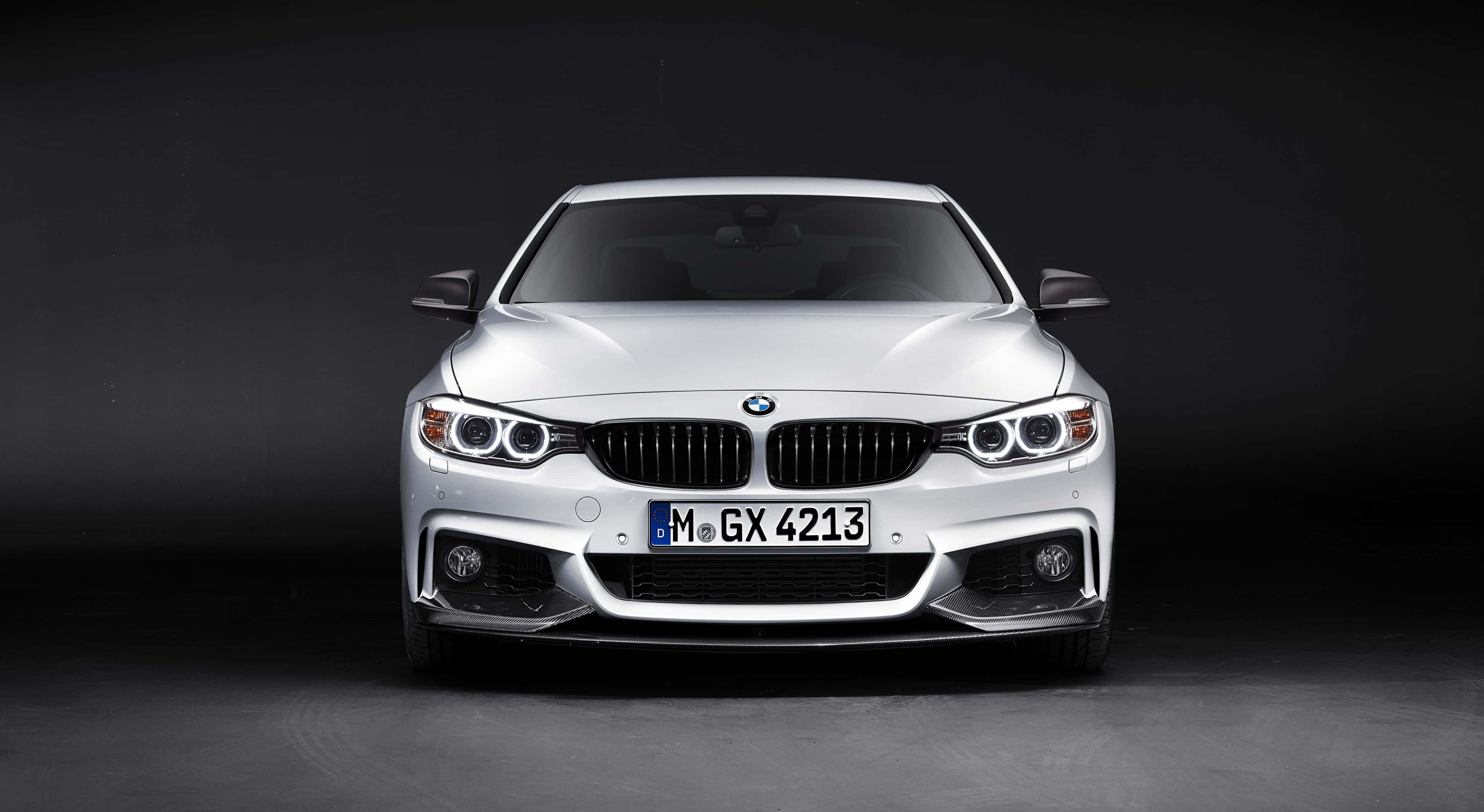 BMW 4 Series, sleek silver, studio lighting, 4K Desktop Wallpaper