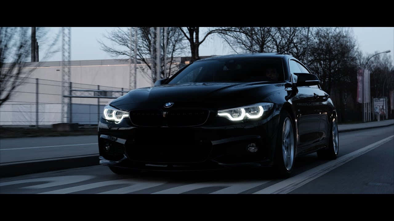 BMW 440i, sleek black, glowing headlights, HD Desktop Wallpaper